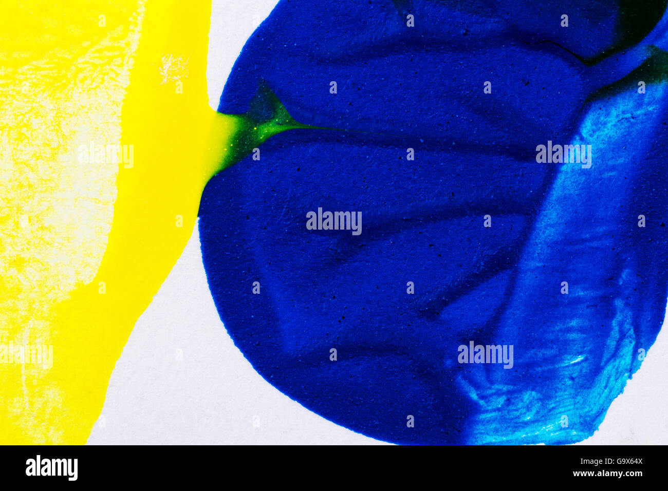 Closeup view of abstract hand painted blue and yellow acrylic art ...
