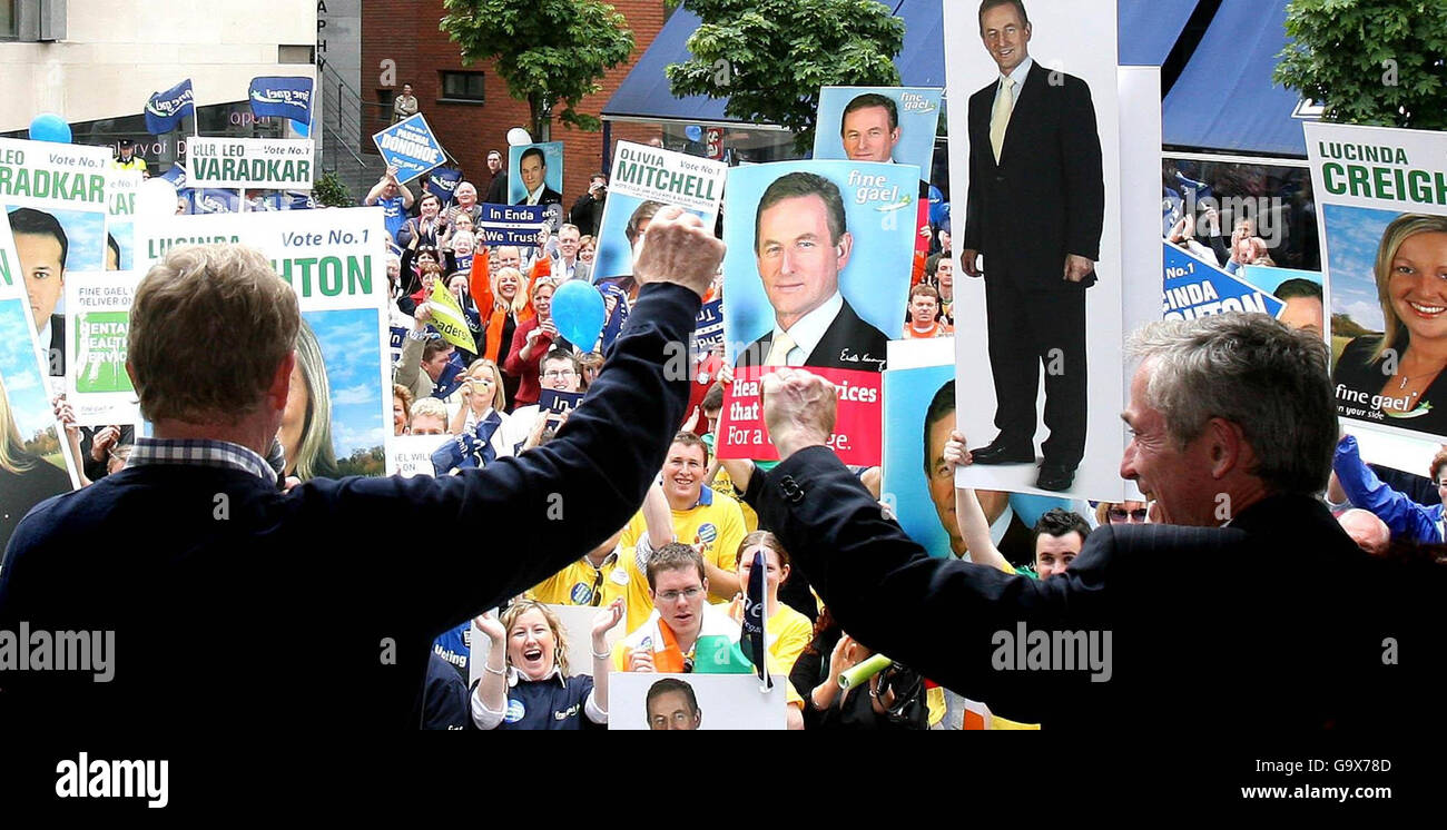 (Left to Right) Enda Kenny and Richard Bruton address hundreds of Fine Gael supporters at a rally in Temple Bar, Dublin. Stock Photo