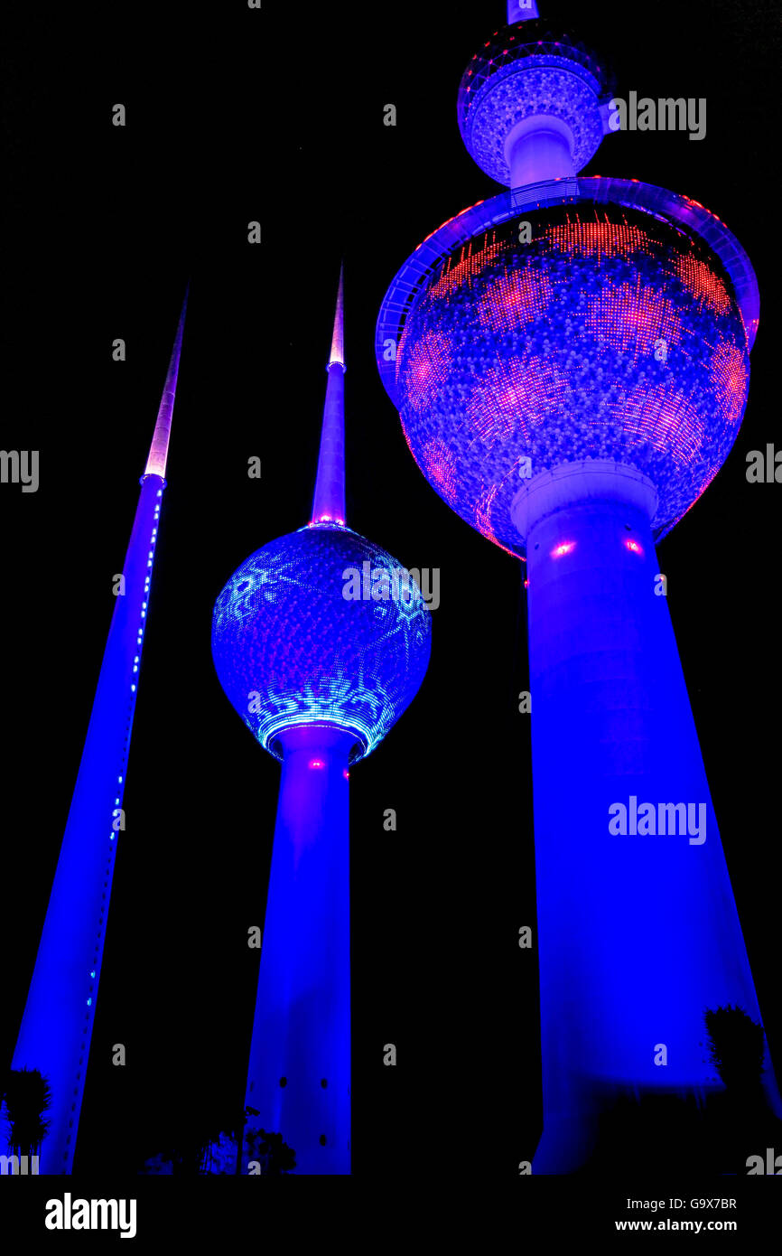 Kuwait Towers illuminated at night in Kuwait City, Kuwait Stock Photo