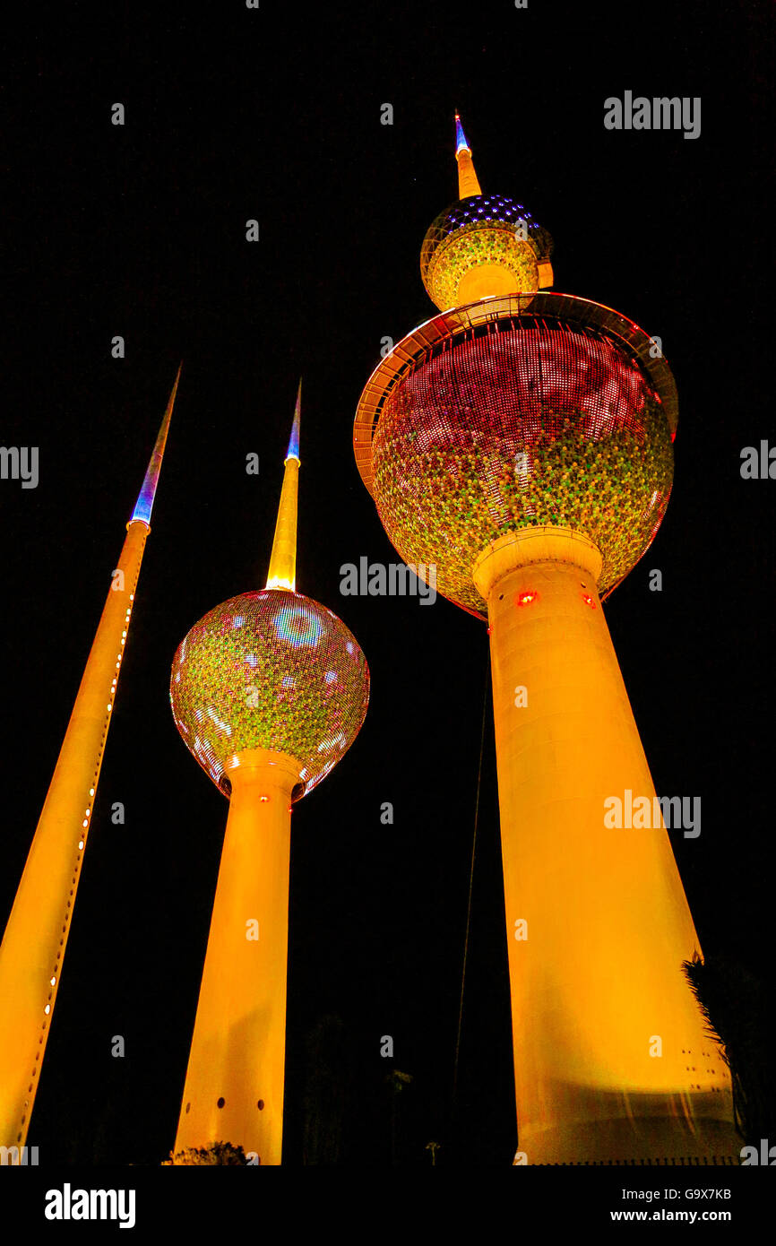 Kuwait Towers illuminated at night in Kuwait City, Kuwait Stock Photo