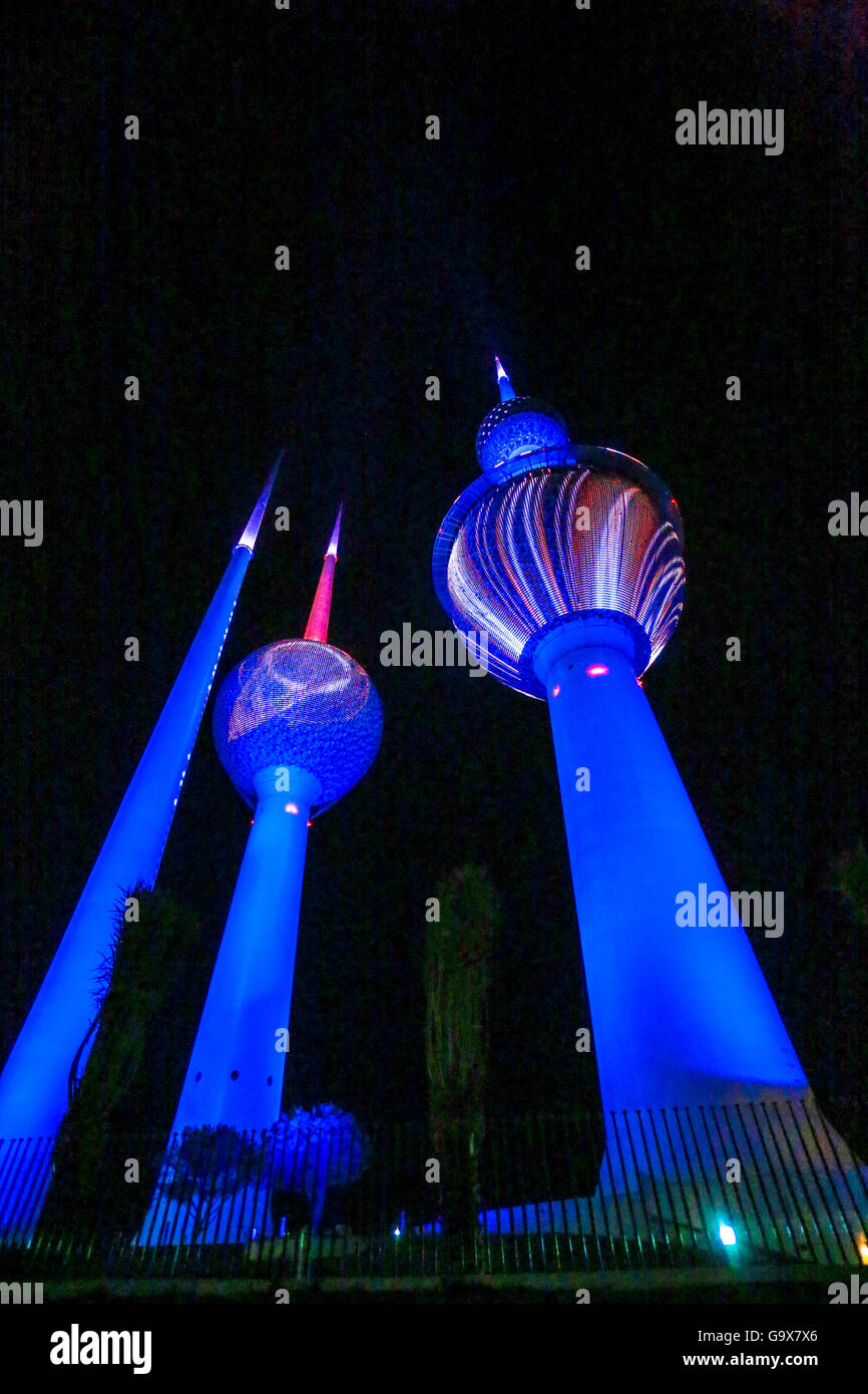 Kuwait Towers illuminated at night in Kuwait City, Kuwait Stock Photo