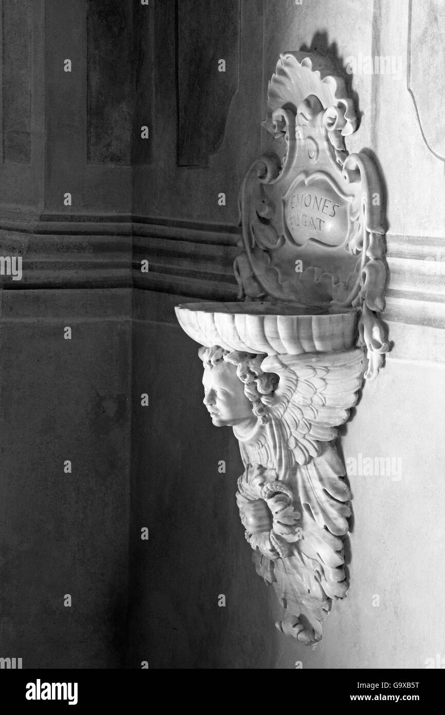 BRESCIA, ITALY - MAY 21, 2016: The baroque stoup in Chiesa di Santa Maria della Carita. Stock Photo