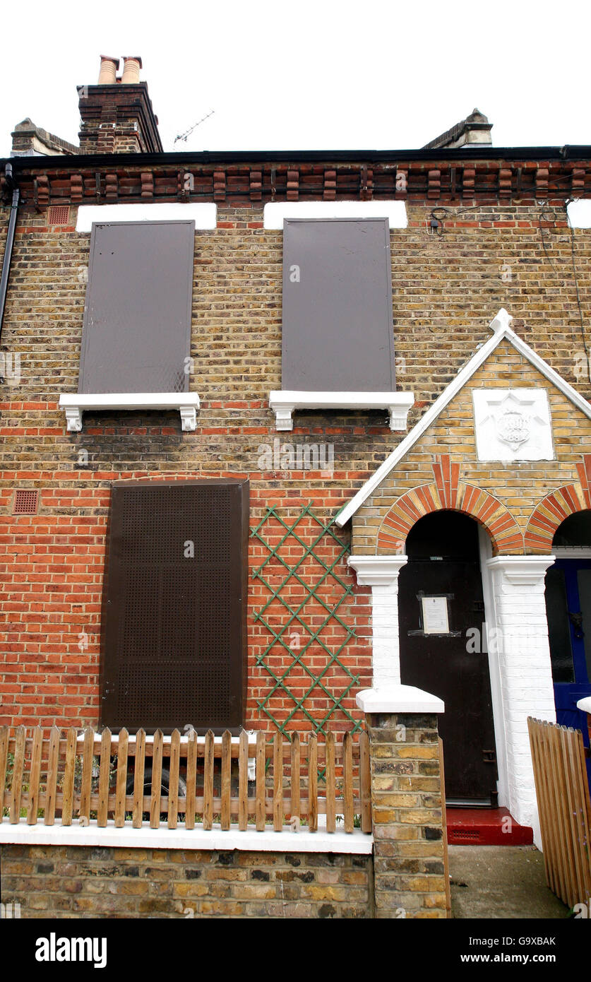 The exterior of a closed down crack house in north kensington hires