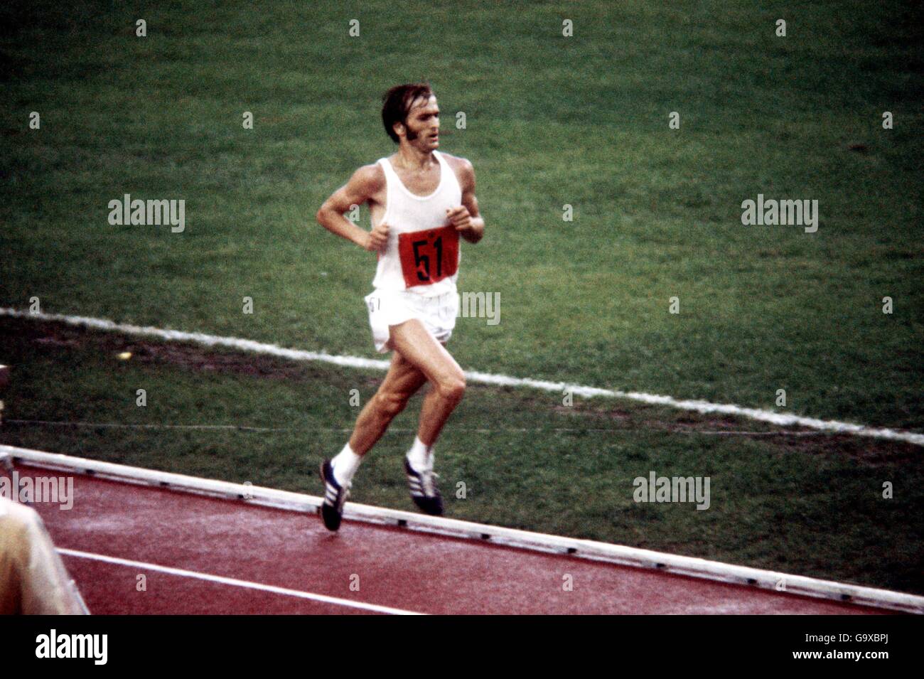 Athletics - 1976 Montreal Olympics - Marathon. East Germany's Waldemar Cierpinski enters the stadium on his way to a gold medal and Olympic record Stock Photo