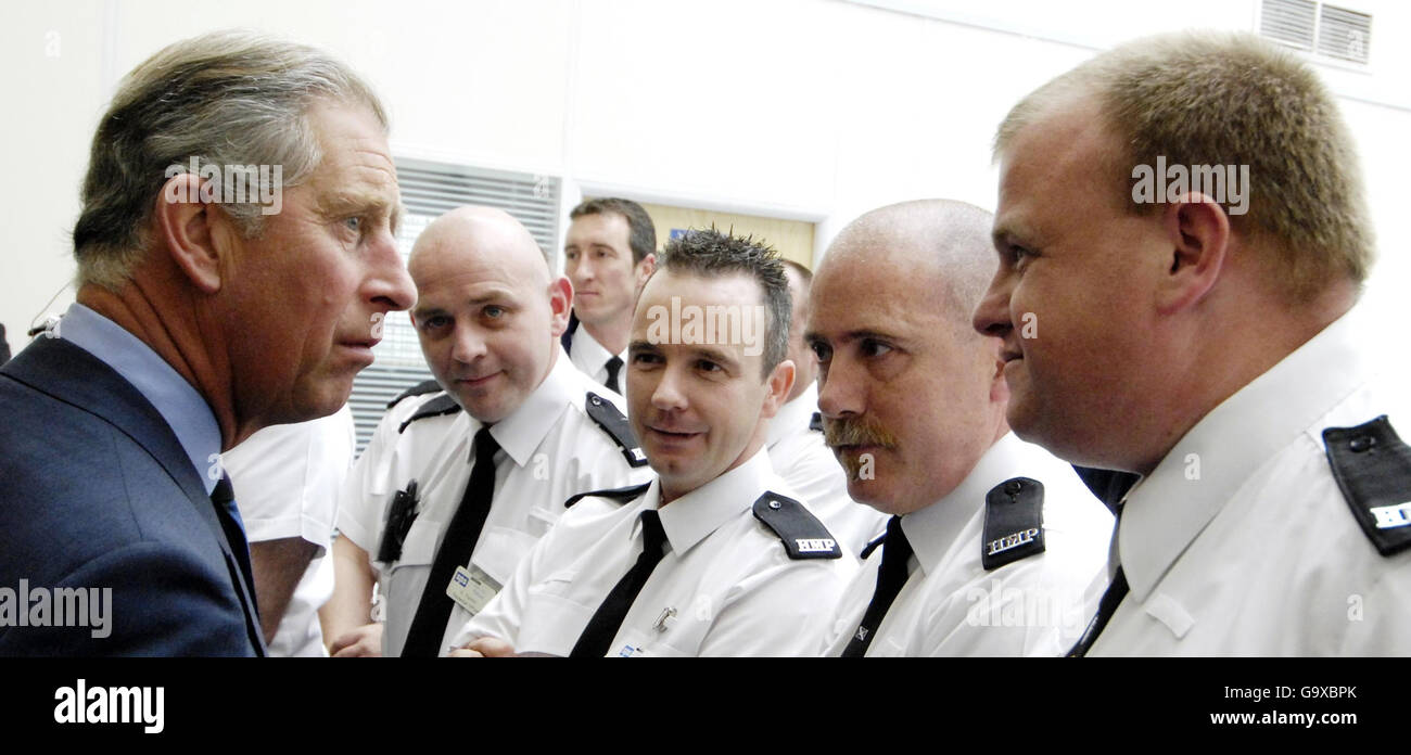 The Prince of Wales meets guards during a visit to Polmont Young Offenders Institute. Stock Photo