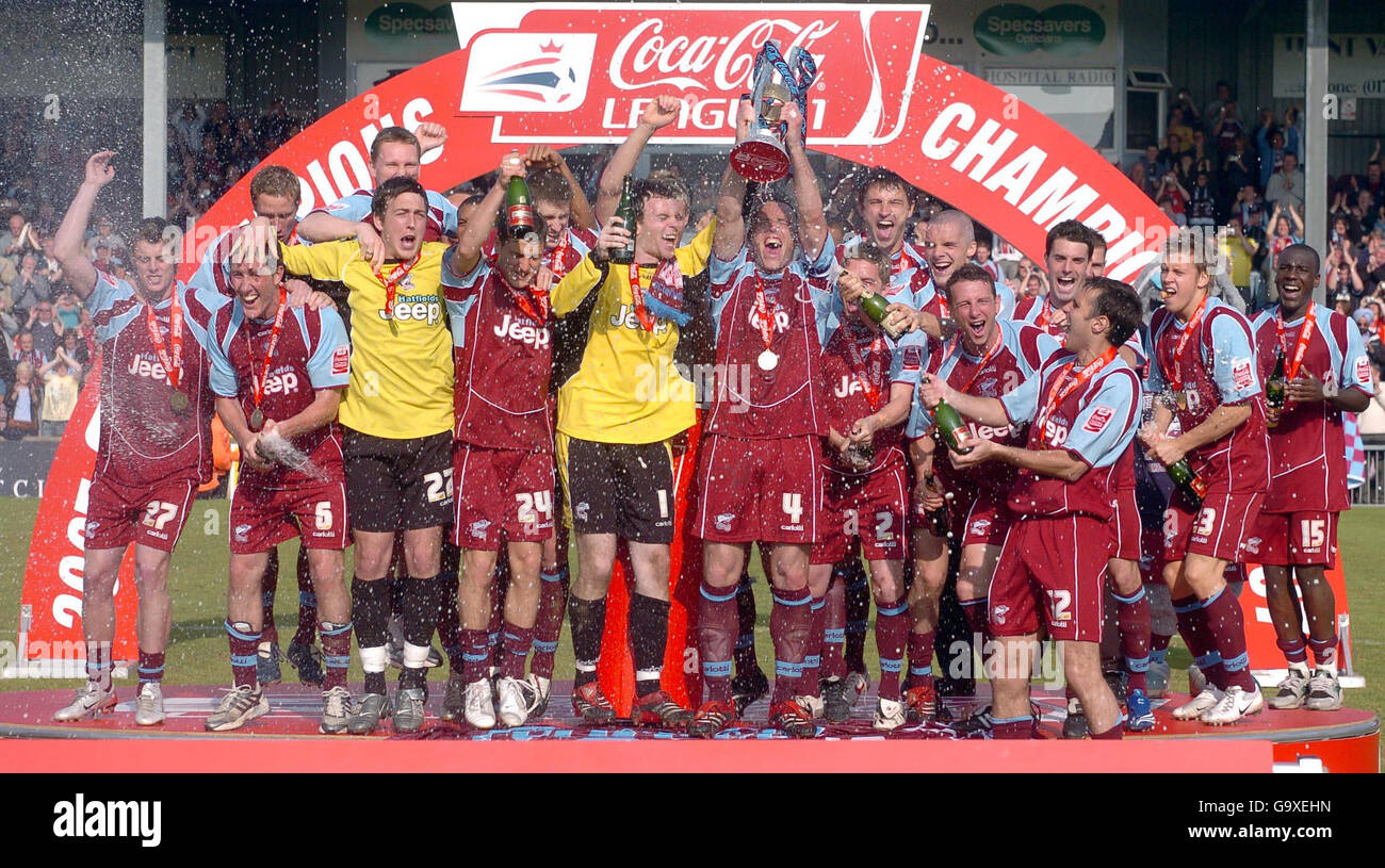 Scunthorpe's players celebrate winning League One following the Coca-Cola Football League One match at Glanford Park, Scunthorpe. Stock Photo