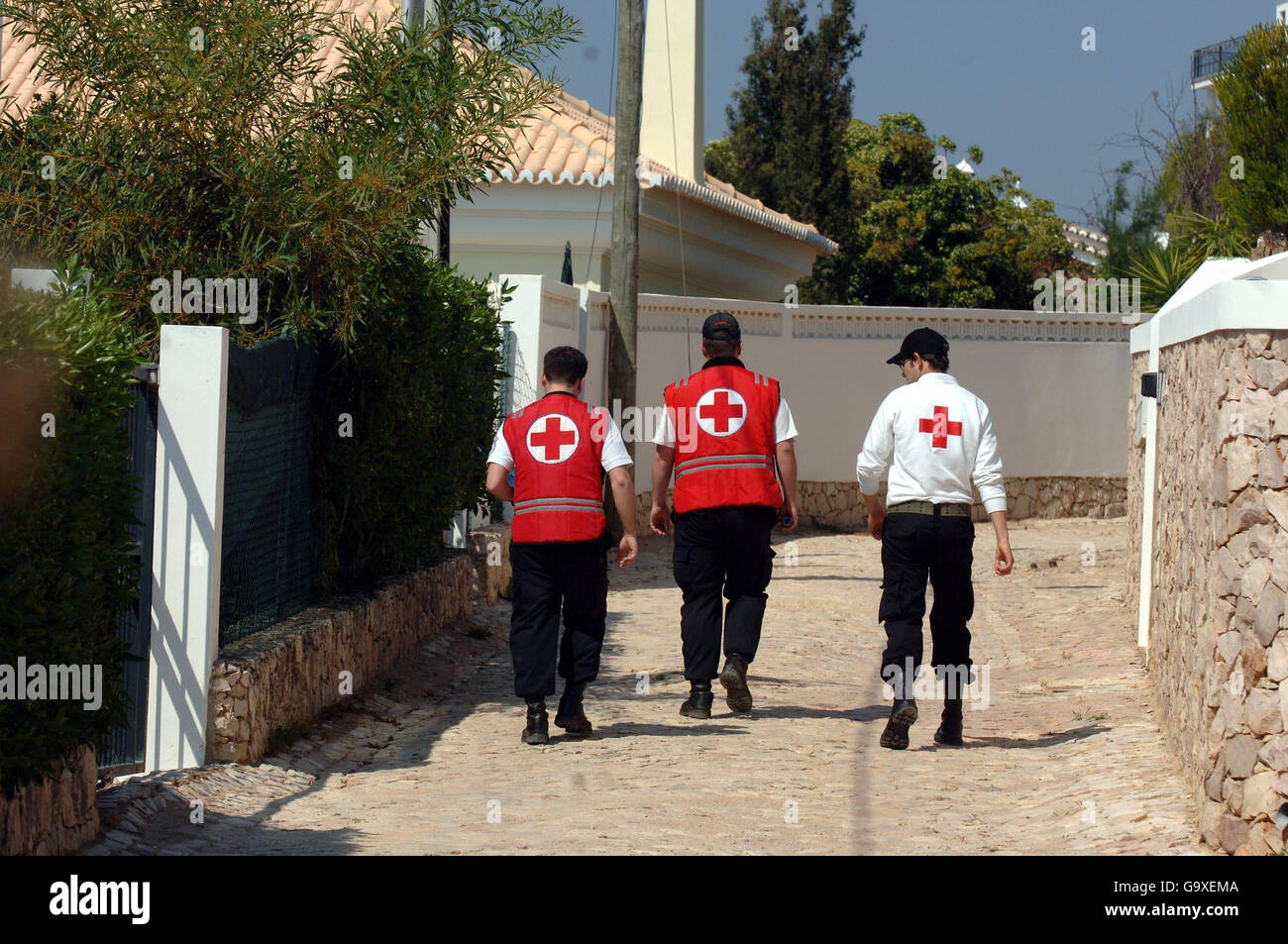 Volunteers from the local Red Cross search Luz in the Algarve, Portugal after 3-year-old Madeleine McCann went missing on Thursday evening. Stock Photo