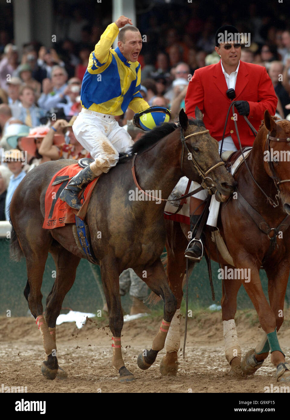 Jockey Calvin Borel celebrates winning the Kentucky Derby on Street