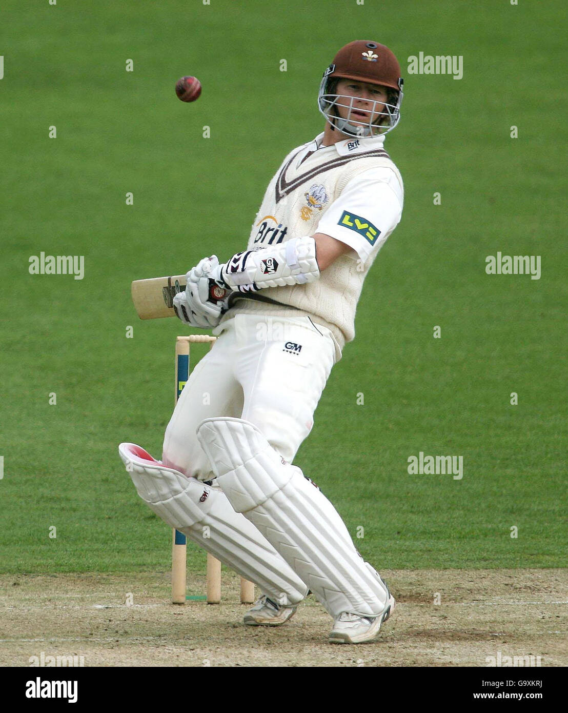 Surrey's Jonathan Batty avoids a bouncer from Sussex's Robin Martin-Jenkins during the Liverpool Victoria County Championship Division One match at at the County Cricket Ground, Hove. Stock Photo