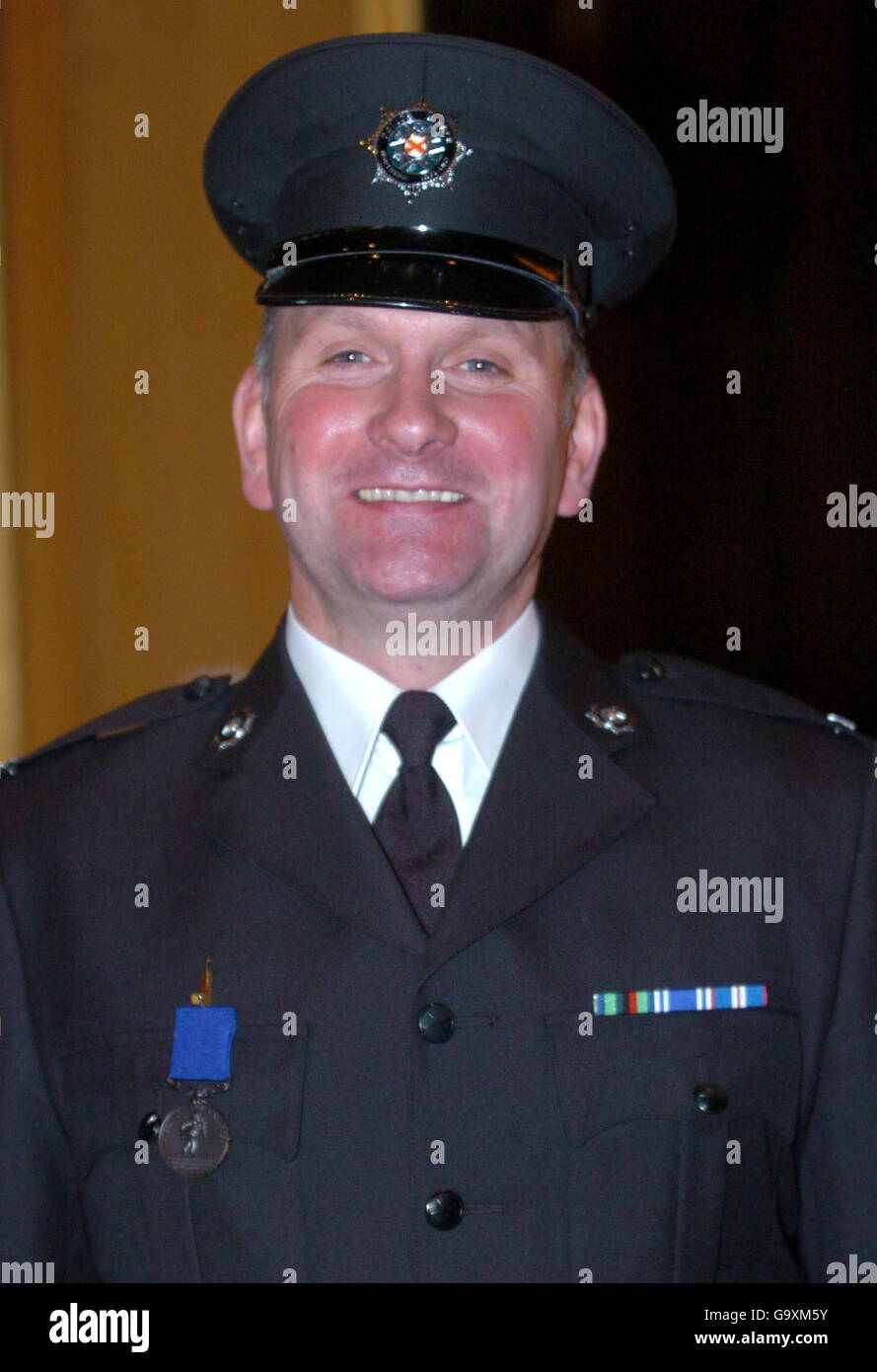 PSNI officer Trevor Anderson after receiving his bravery award from the ...