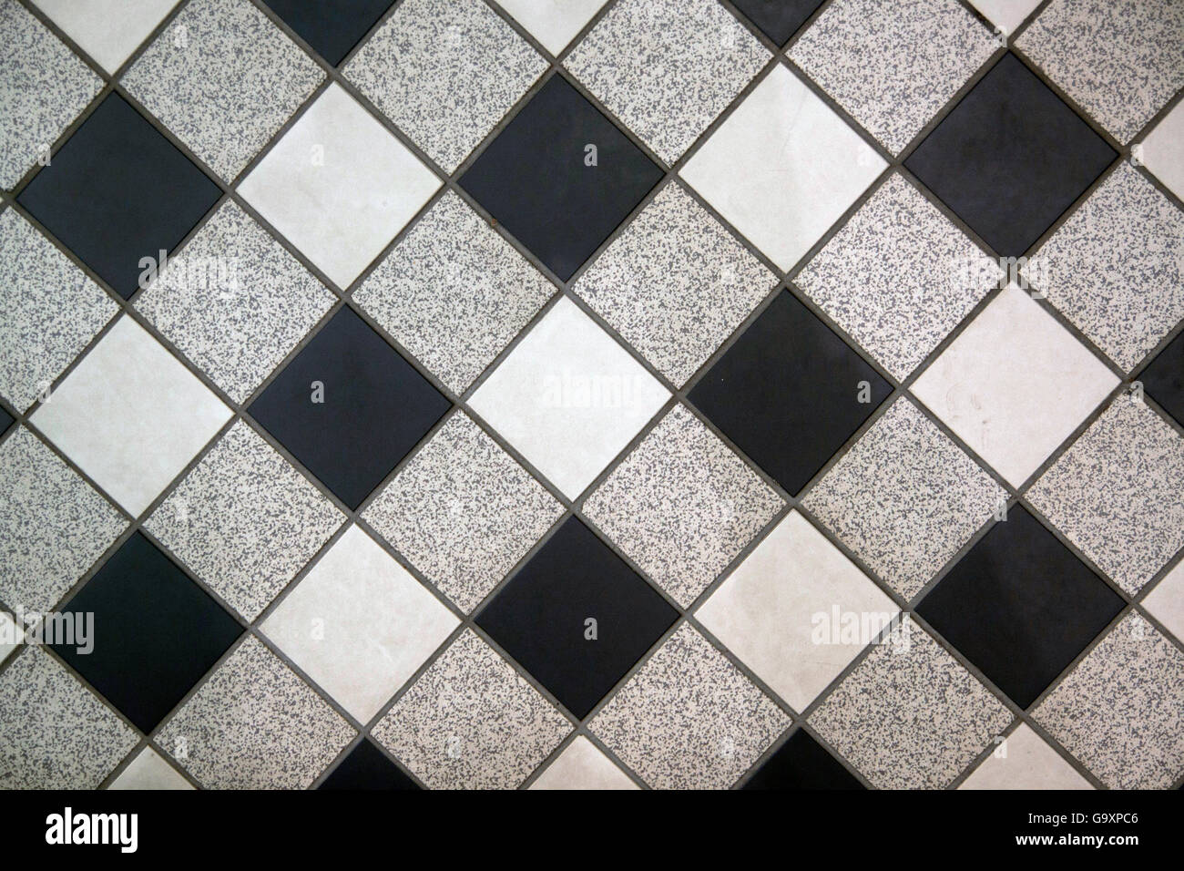 Black white and gray checkered floor tiles - Background image Stock Photo -  Alamy