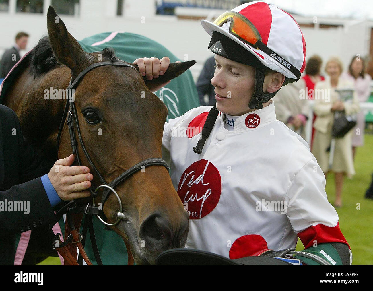 Jamie Spencer with Red Evie, after they won Juddmonte Lockinge Stakes (Group 1) at Newbury Racecourse. Stock Photo
