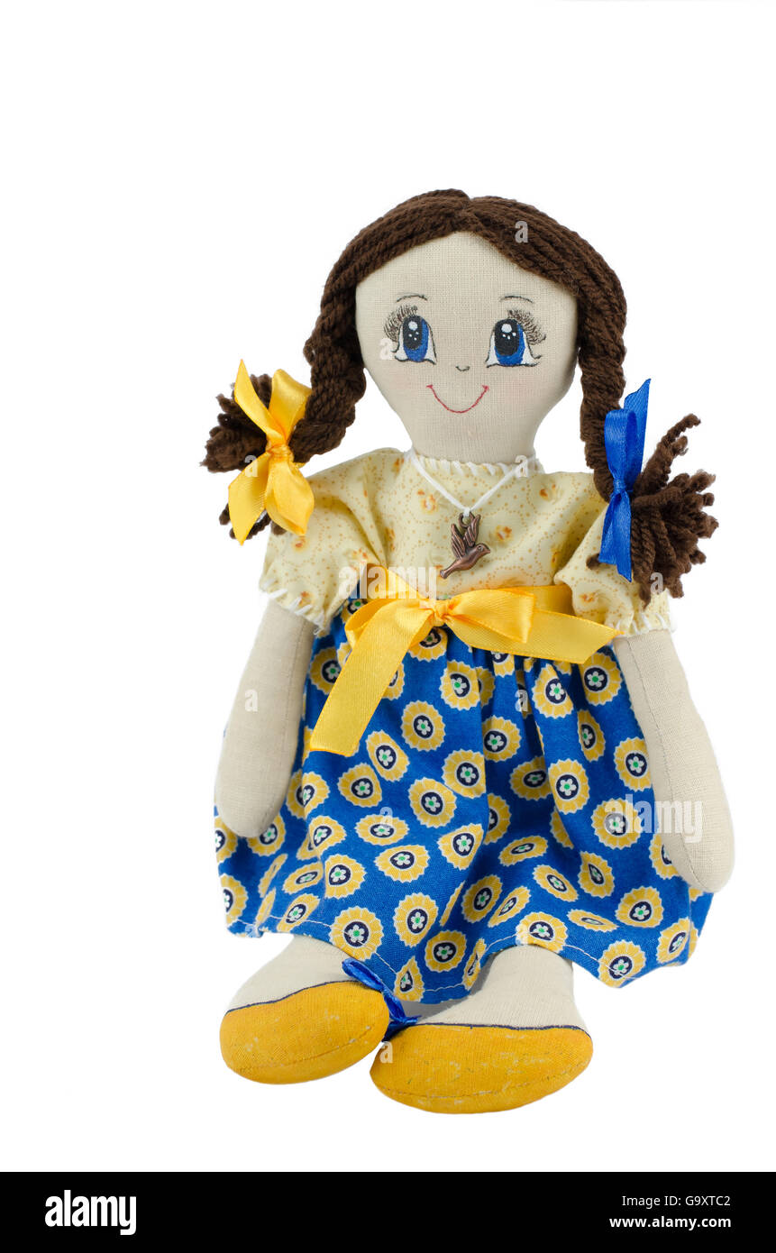 Rag doll girl in Ukrainian patriotic colors isolated on white Stock Photo