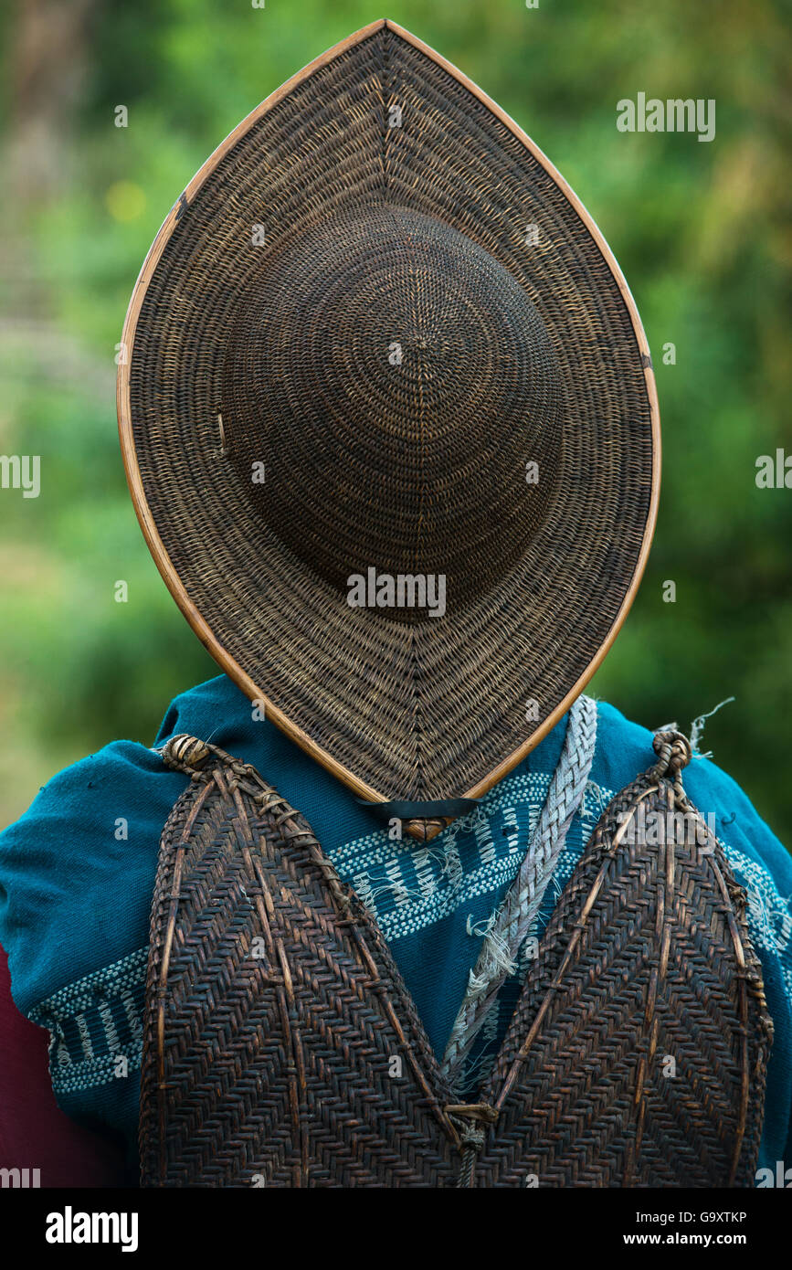 Adi Gallong man wearing traditional cane hat. Adi Gallong Tribe. Arunachal Pradesh, North East India, October 2014. Stock Photo