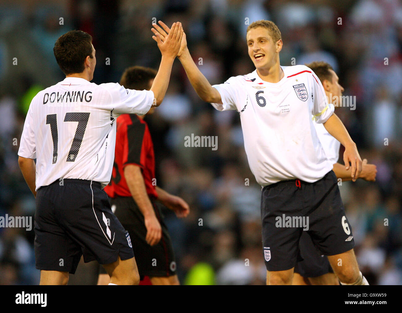 England's Stewart Downing celebrates with Michael Dawson Stock Photo