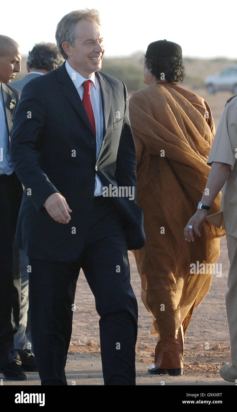 Prime Minister Tony Blair prepares to depart from meeting Libyan leader Muammar Gaddafi (right) at Gaddafi's desert base near Sirte, Libya, following an hour-long meeting. Stock Photo