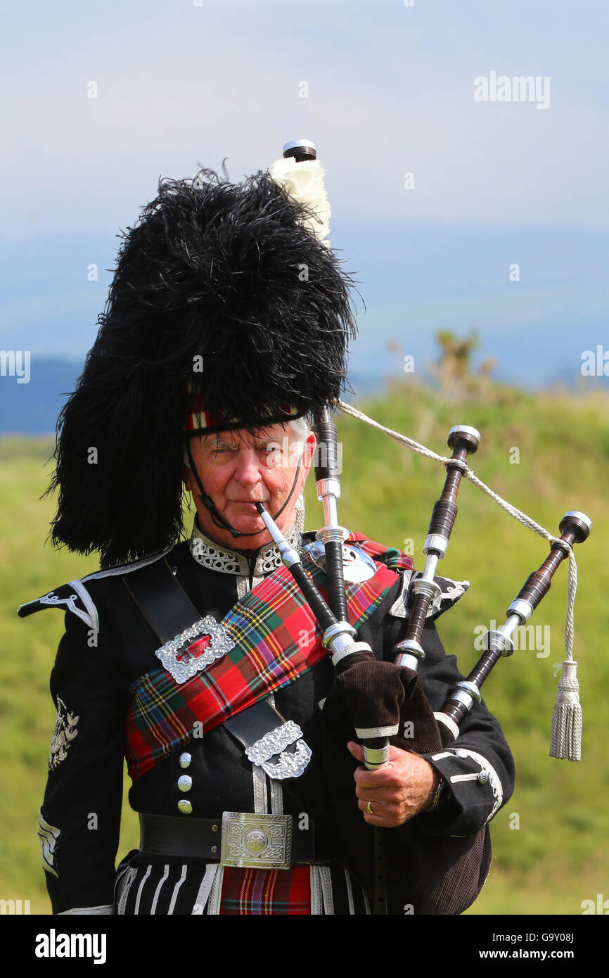Scots piper in full military highland dress with bagpipes, Ayrshire