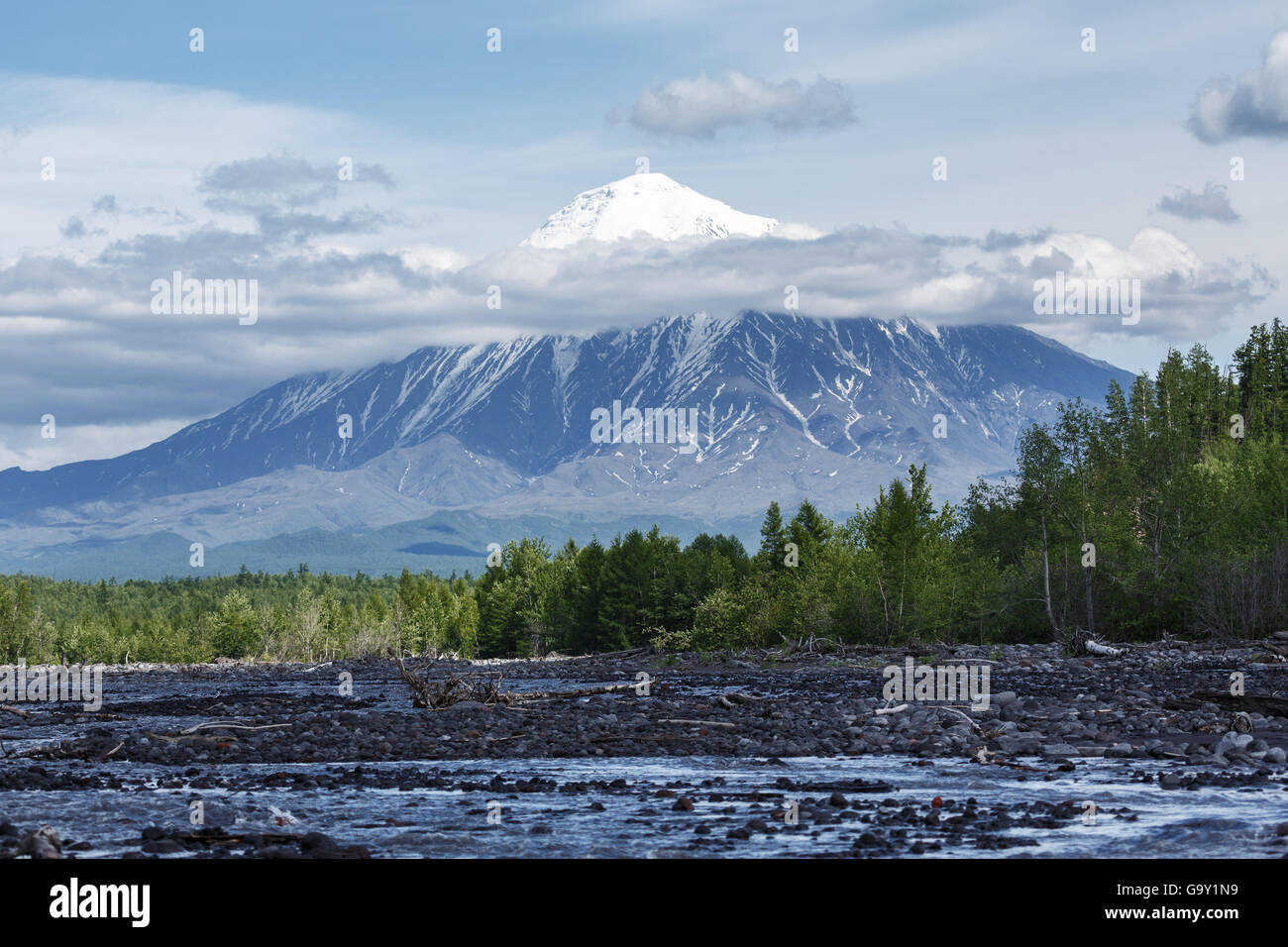 Beautiful summer volcanic landscape of Kamchatka Peninsula: view on Ostry Tolbachik Volcano on a sunny day. Russian Far East. Stock Photo