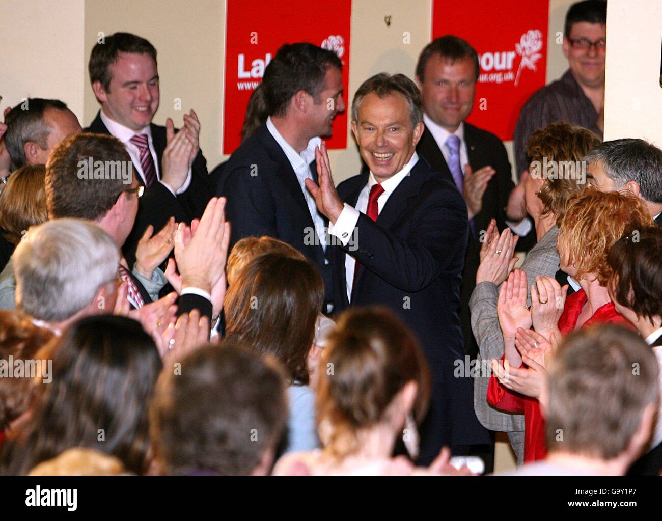 Prime Minister Tony Blair arrives at the press conference to announce