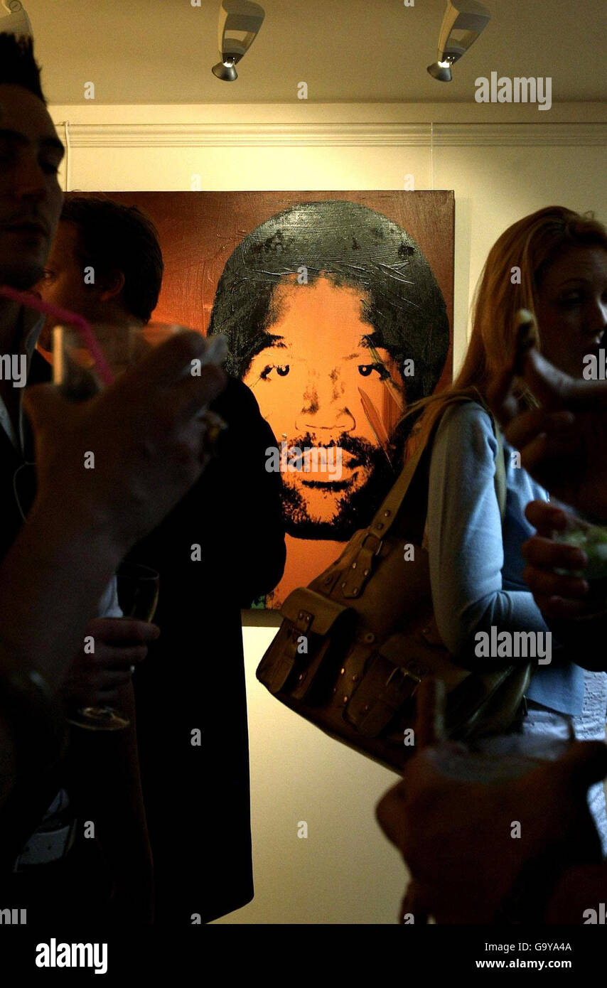 An Andy Warhol painting of O.J. Simpson at the private view for Andy Warhol's Athlete Series at Studio 54 in central London. Stock Photo