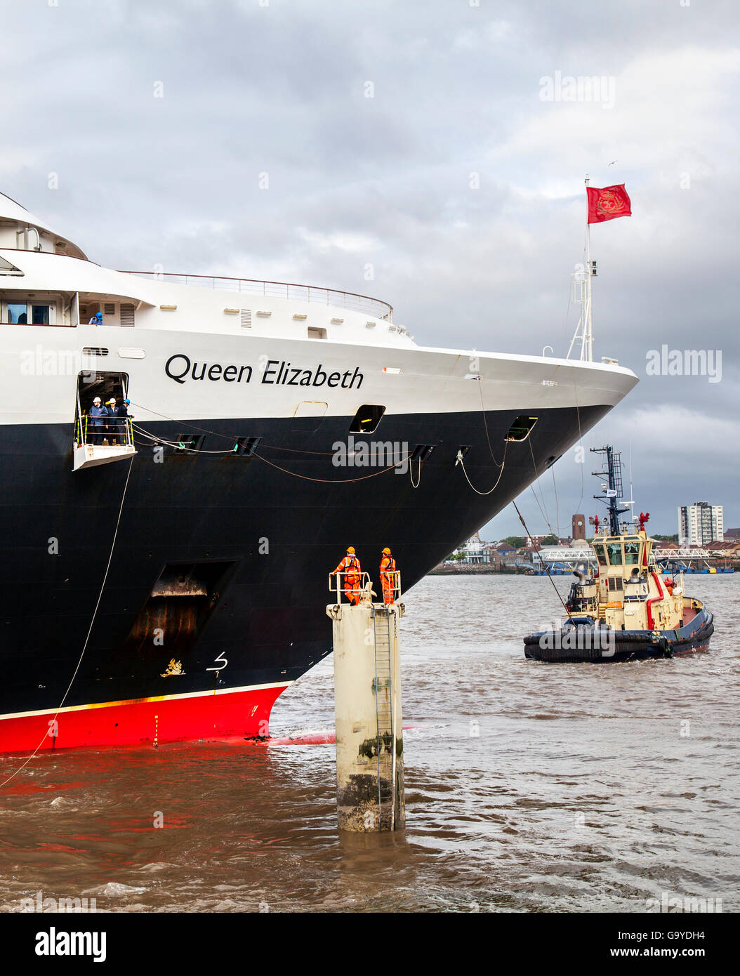 Liverpool, Merseyside, UK. 2nd July, 2016. The 211ft Tall Queen Elizabeth liner arriving to celebrate the centenary of the Cunard Building one of Liverpool's iconic buildings that make up the Pier Head's Three Graces. The captain of the Queen Elizabeth II, Inger Klein Olsen – the first ever female captain of a Cunard ship, is to unveil the seat which runs the full length of the Cunard Building on the Strand. Credit:  MediaWorldImages/Alamy Live News Stock Photo