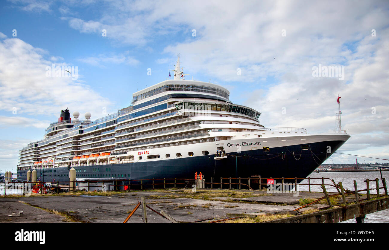 Liverpool, Merseyside, UK. 2nd July, 2016. The 211ft Tall Queen Elizabeth liner arriving to celebrate the centenary of the Cunard Building one of Liverpool's iconic buildings that make up the Pier Head's Three Graces. The captain of the Queen Elizabeth II, Inger Klein Olsen – the first ever female captain of a Cunard ship, is to unveil the seat which runs the full length of the Cunard Building on the Strand. Credit:  MediaWorldImages/Alamy Live News Stock Photo