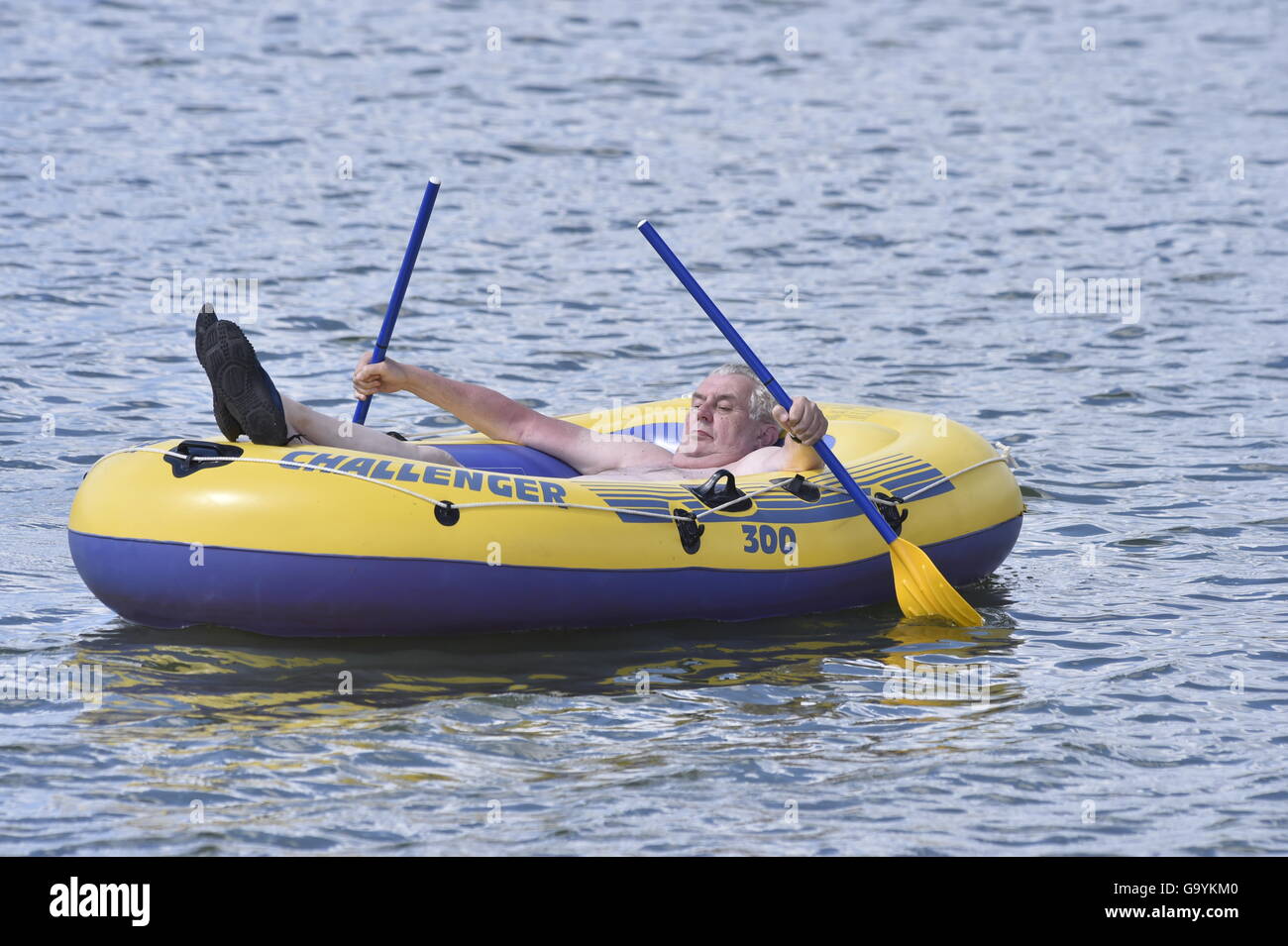 Nove Veseli, Vysocina Region. 4th July, 2016. Czech President Milos Zeman enjoys a inflatable boat ride around pond in Nove Veseli, Vysocina Region, Czech Republic, July 4, 2016. CTK Photo/Lubos Pavlicek) Stock Photo
