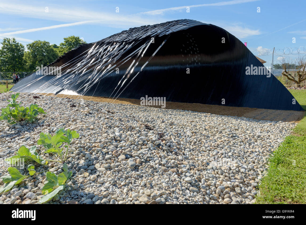 The Our Lives in Time's Hands conceptual Garden designed by Mark Whyte and Abigail Ferguson at the RHS Annual Hampton Court Palace Flower Show, Hampton, England, UK. July 4, 2016 Credit:  P Tomlins/Alamy Live News Stock Photo
