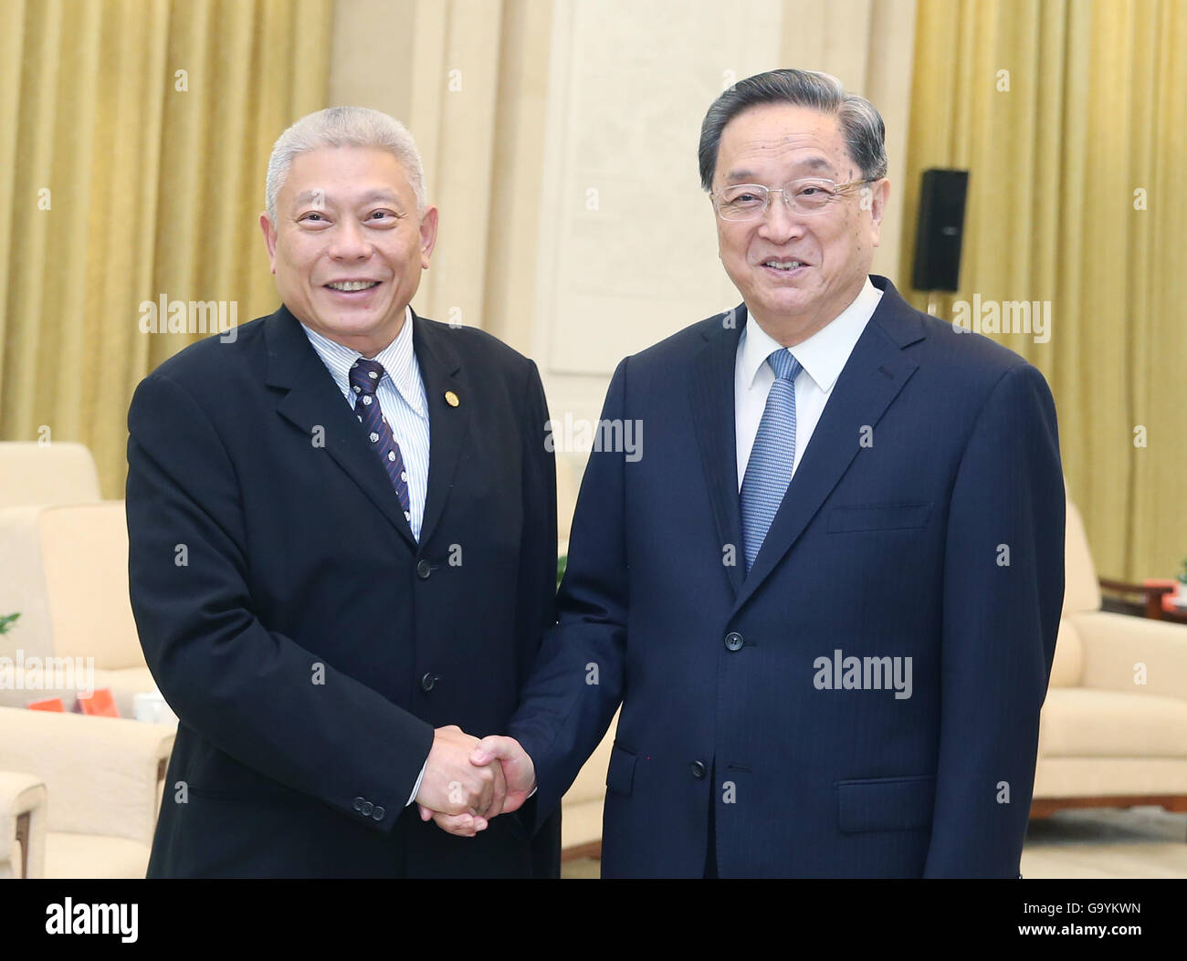 Beijing, China. 4th July, 2016. Yu Zhengsheng (R), chairman of the ...