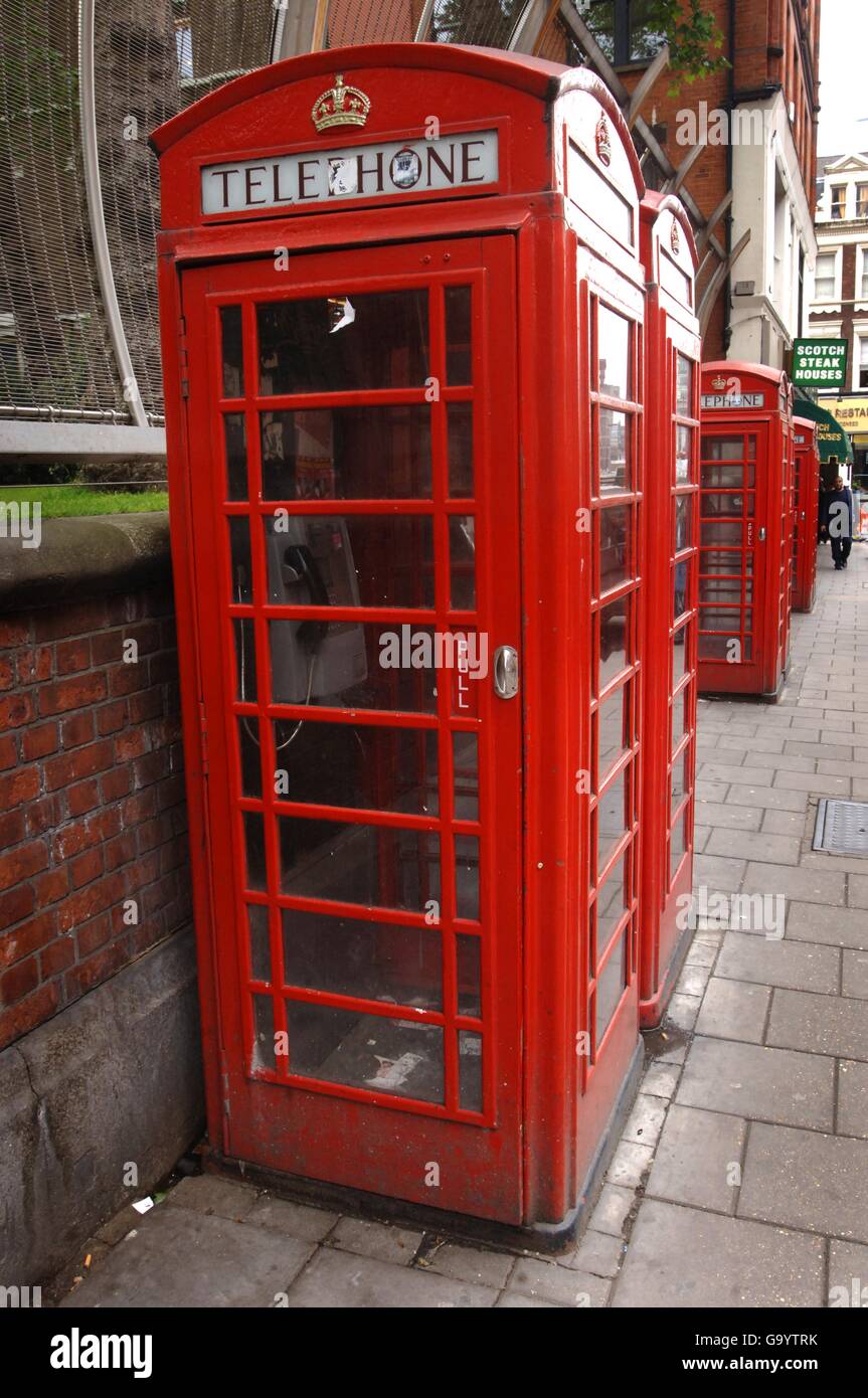Red telephone boxes stand in soho in central london hires stock