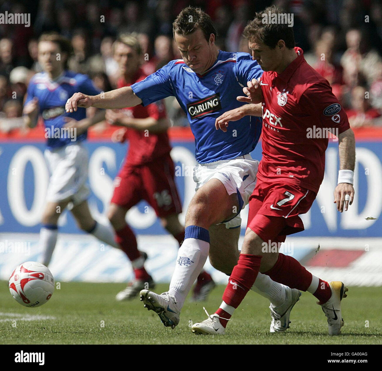 Rangers' Gavin Rae (left) tackles Aberdeen's Jamie Smith during the ...