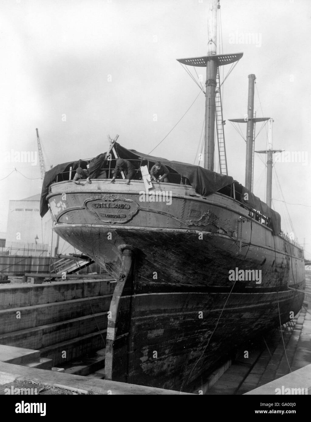 Pictured in her dry berth at Greenwich as men started work on her stern. Stock Photo