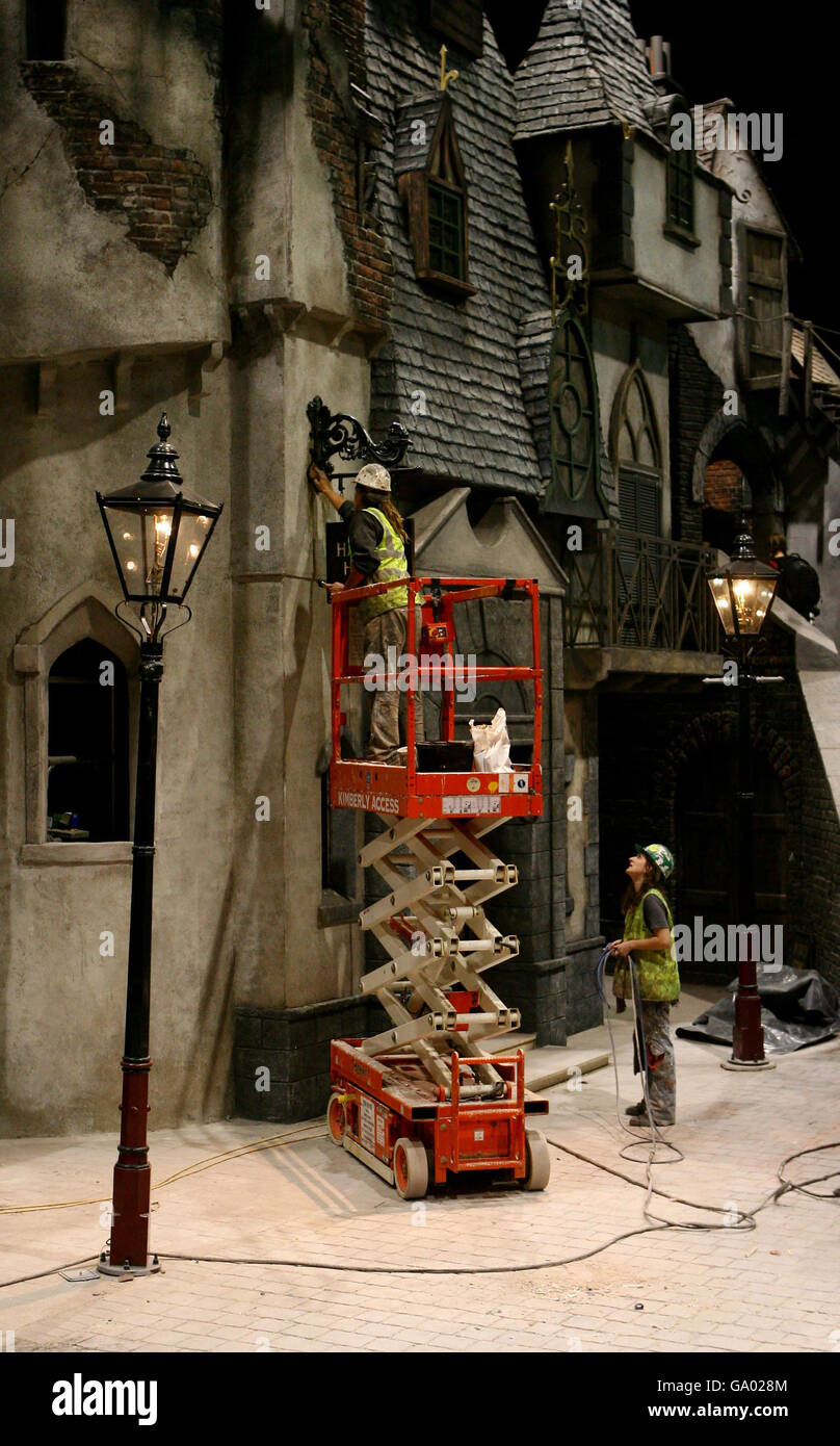 Workmen put the finishing touches to Dickens World at Chatham in Kent, which is due to open this week. Stock Photo