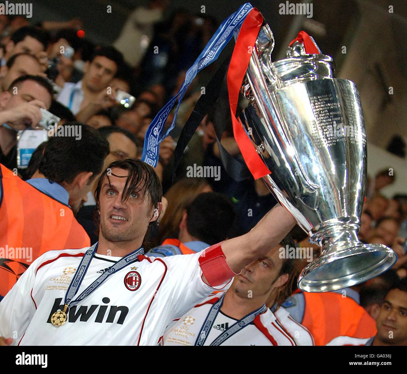 AC Milan's Paolo Maldini clebrates with the trophy after the final whistle. Stock Photo