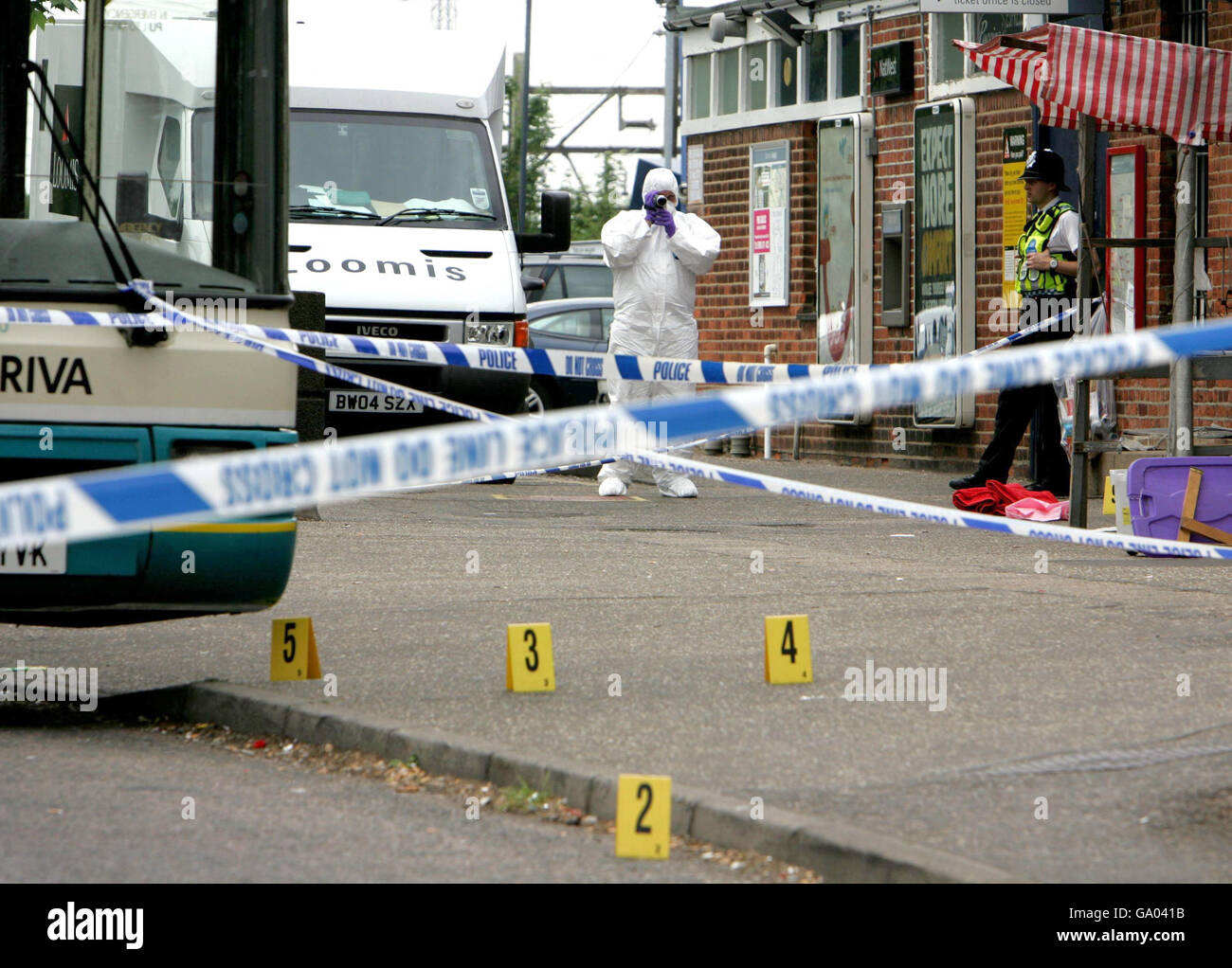 Police forensics officer scene shooting rayleigh railway station in