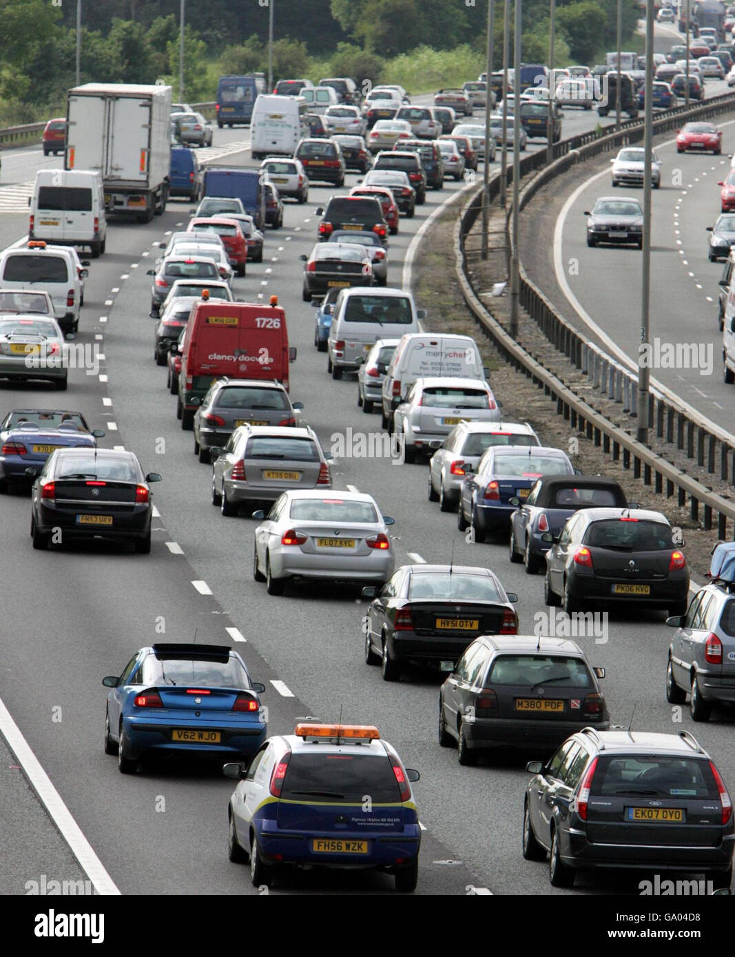 Heavy traffic on the M4 at junction 11 westbound, as the Bank Holiday weekend getaway begins. Stock Photo