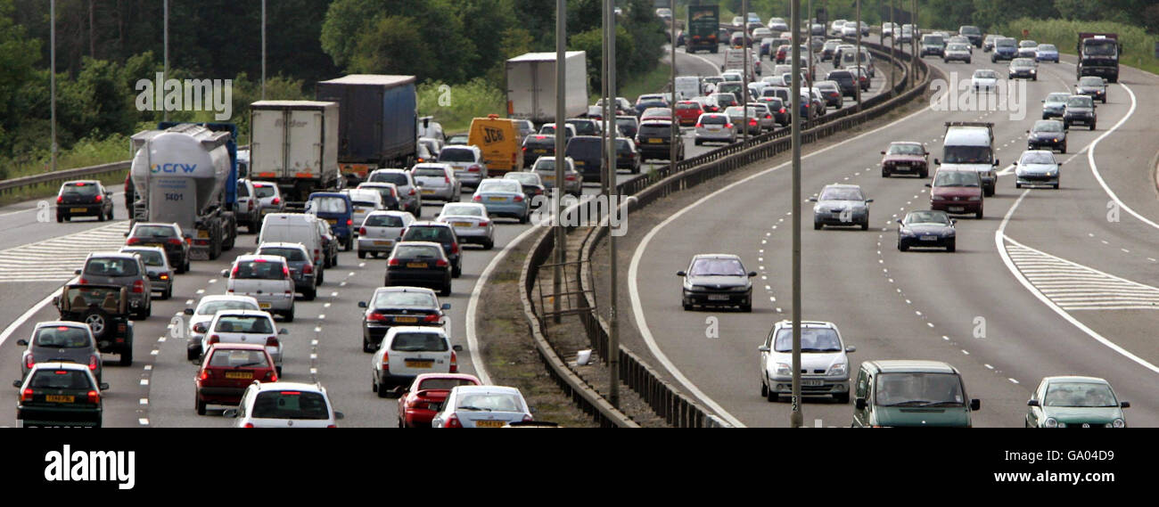 Heavy traffic on the M4 at junction 11 westbound, as the Bank Holiday weekend getaway begins. Stock Photo