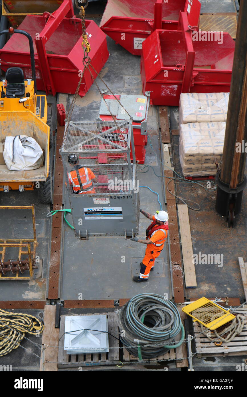 Construction Workers on a barge on the Thames at Blackfriars Stock Photo