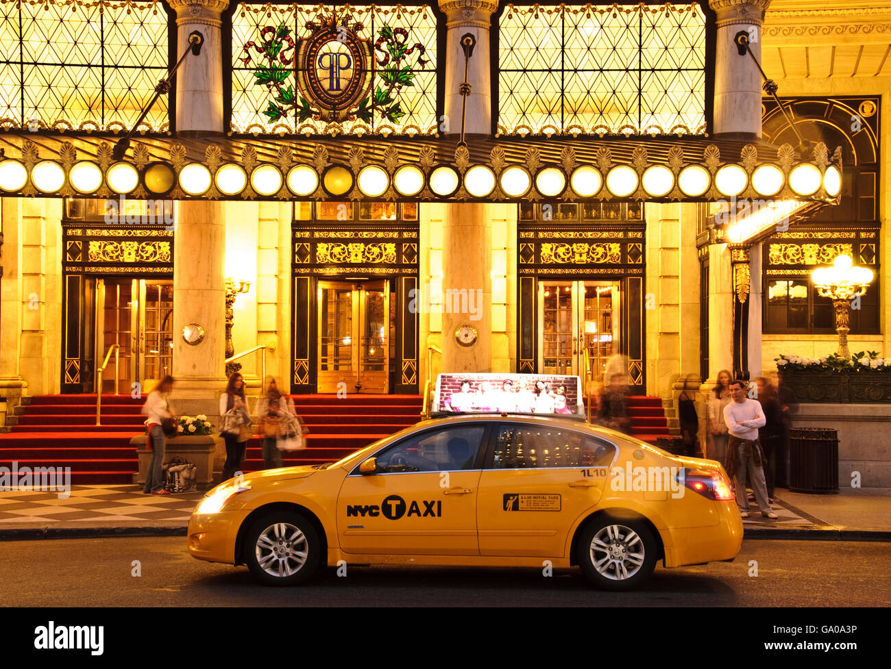 Yellow cab parked in front of the Plaza Hotel, 5th Avenue, New York City, New York, USA Stock Photo