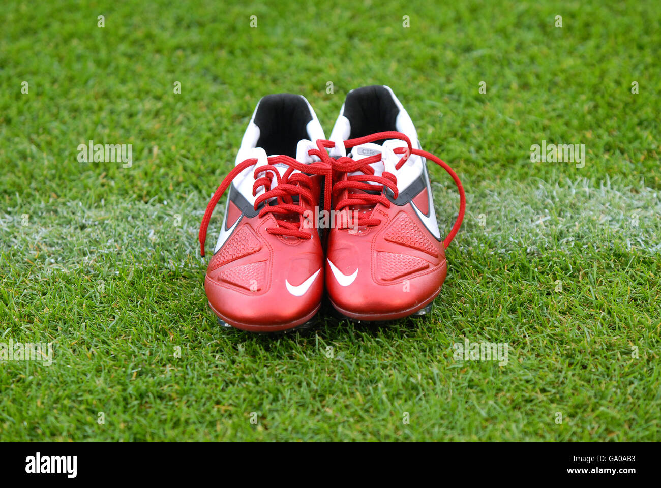 Red Nike football boots placed on the sideline, LIGA total! Cup 2011, Coface Arena, Mainz, Rhineland-Palatinate Stock Photo