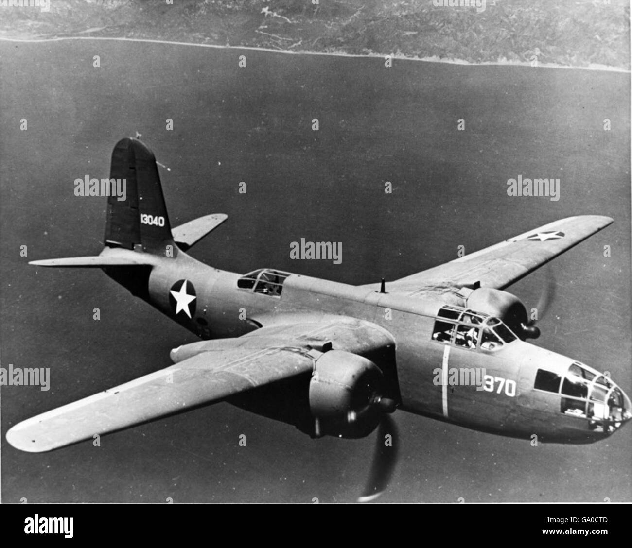 A 1950s-era U.S. Air Force aircraft in flight, captured as part of the ...