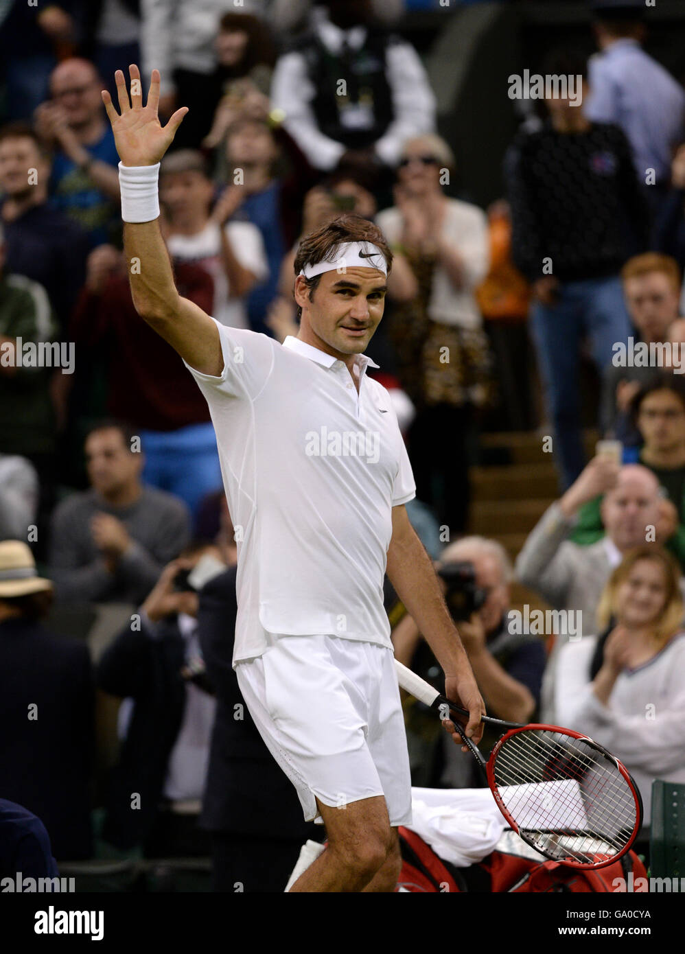 Roger Federer celebrates beating Dan Evans on day Five of the Wimbledon ...