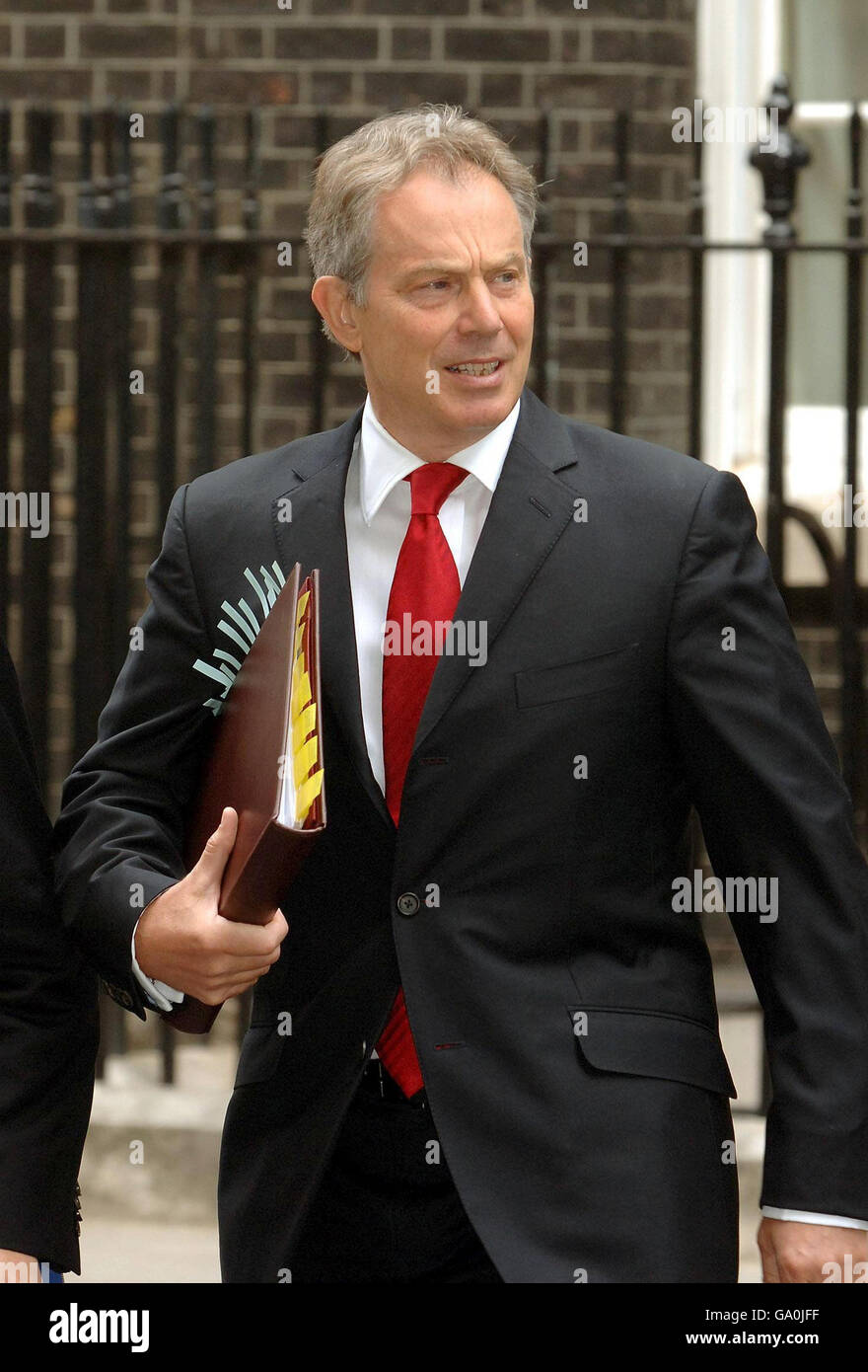 British Prime Minister Tony Blair leaves Downing Street for the House of Commons where he will speak at Prime Minister's Questions. Stock Photo