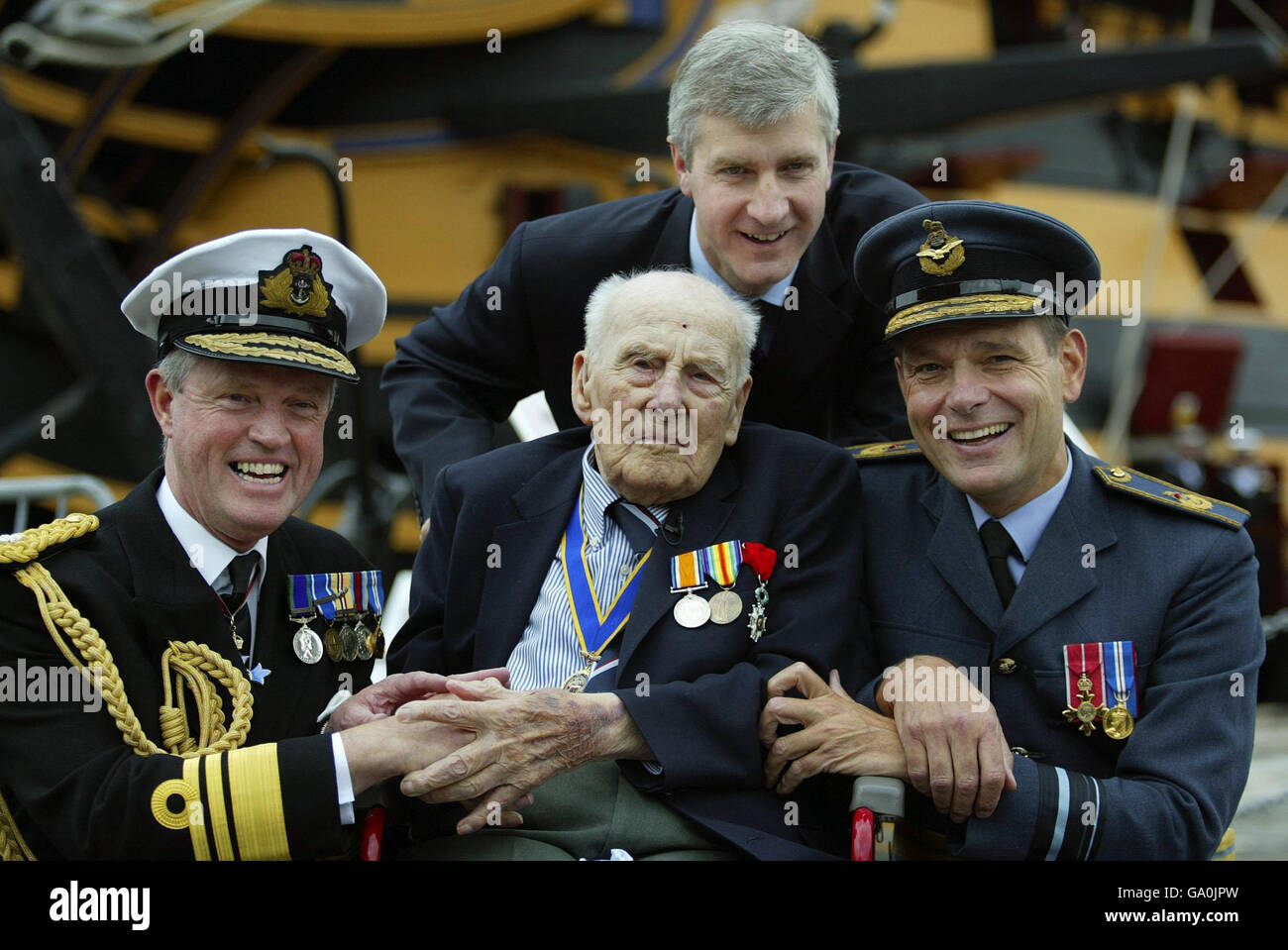 Britain's oldest Royal Navy veteran Henry Allingham with Vice Admiral Adrian Johns (left), Air