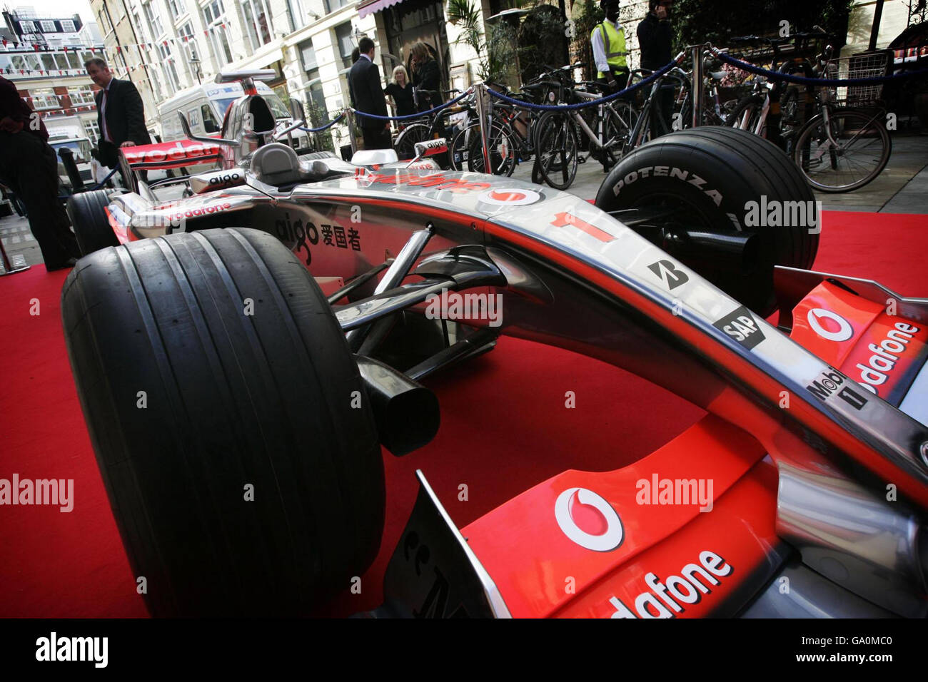 Celebrating F1 victory, McLaren exhibit a Mercedes racing car model, sponsored by Spanish bank Santander, at Spanish street festival A Taste of Spain, near Regent Street, in central London. Stock Photo