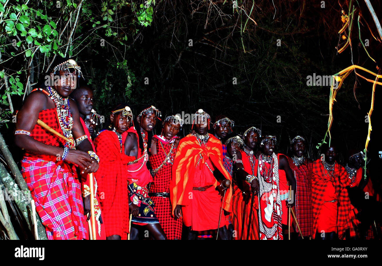 Masai Mara prepare to perform a ceremonial dance on the savannah as Sir Richard Branson visited Kenya to promote Virgin Atlantics new daily service to the Kernyan capital, Nairobi. Stock Photo