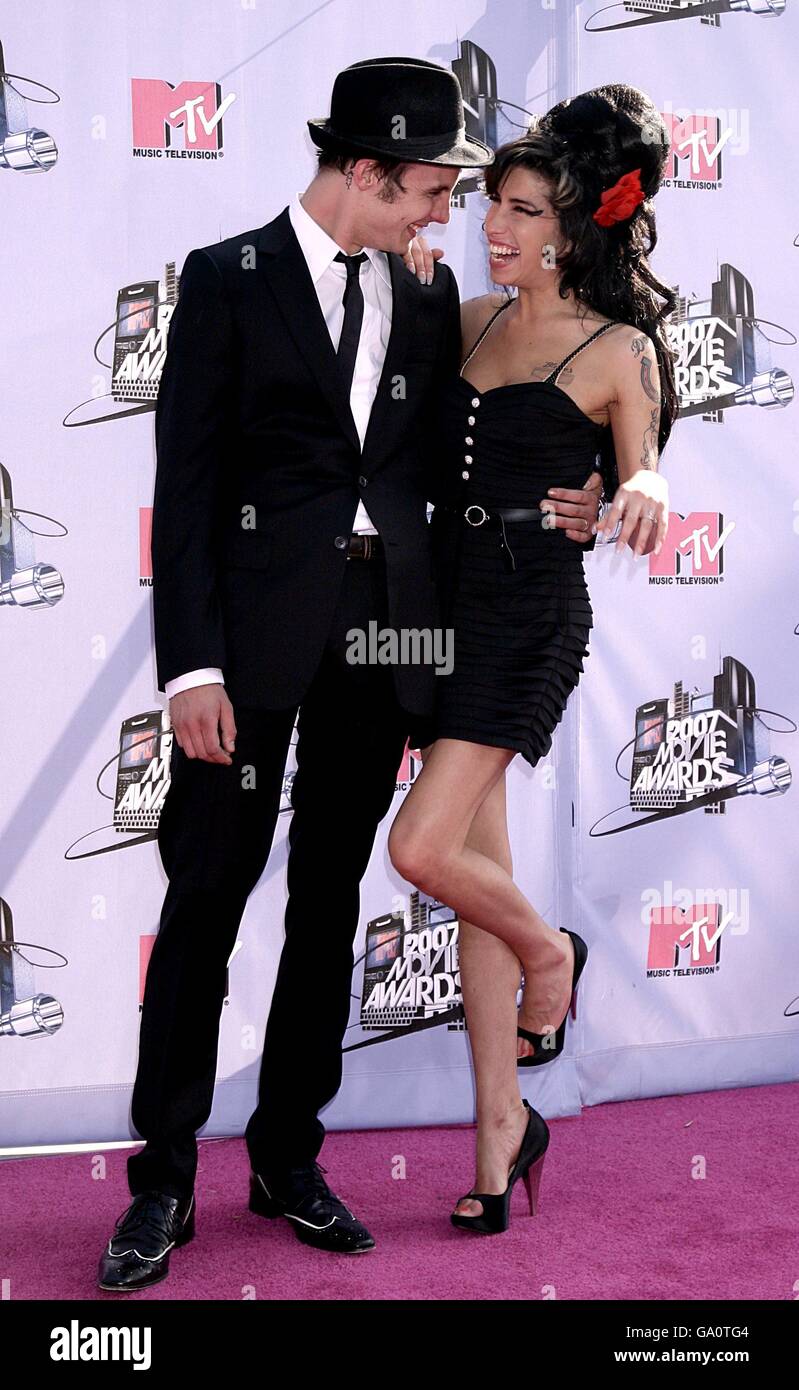 Amy Winehouse and her husband Blake Fielder-Civil arrive for the 2007 MTV Movie awards at the Gibson Amphitheatre, Universal City, Los Angeles. Stock Photo