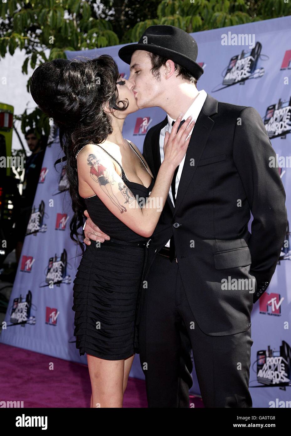 Amy Winehouse and her husband Blake Fielder-Civil arrive for the 2007 MTV Movie awards at the Gibson Amphitheatre, Universal City, Los Angeles. Stock Photo