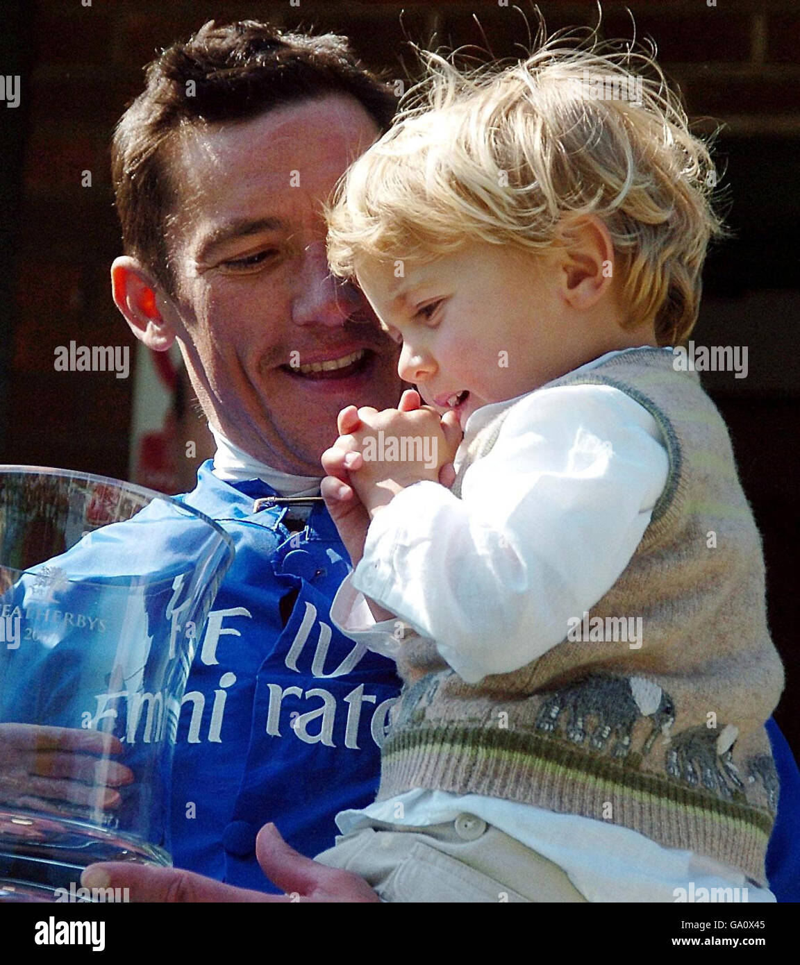 Frankie Dettori celebrates with his son Rocco after winning The Weatherbys Bank Handicap at Ripon Racecourse. Stock Photo