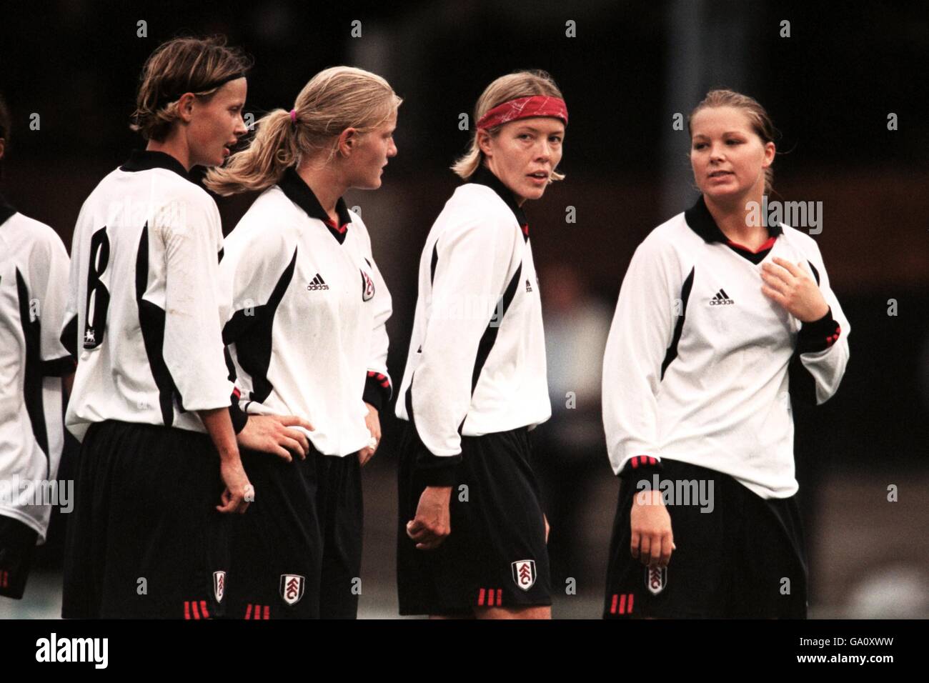 (L-R) Fulham Ladies' Lynn Rebecca Mork, Katie Chapman, Marianne Pettersen and Rachel Unitt form a wall to defend a free kick Stock Photo